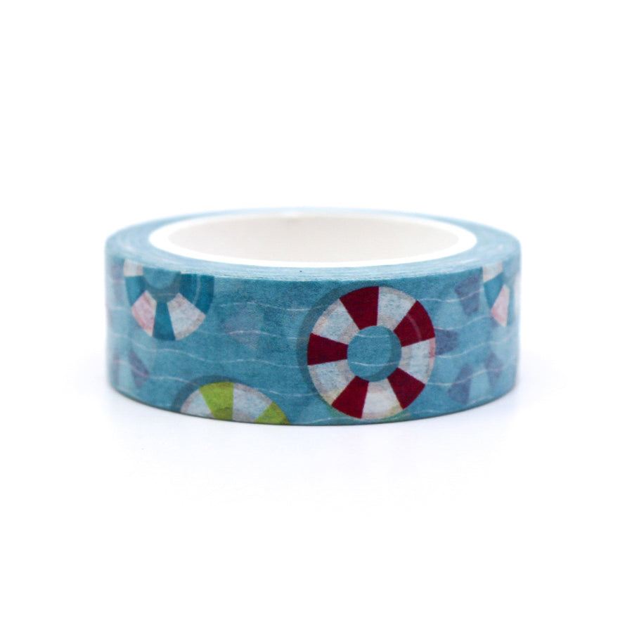 Add a splash of fun to your crafts with this playful washi tape featuring colorful pool floaties and tropical designs, perfect for summer-themed projects and planners. This tape is from Penpaling Paula and sold at BBB Supplies Craft Shop.