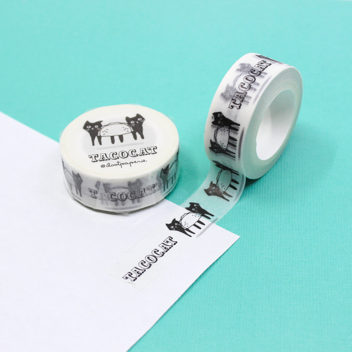 "Black and White Taco Cat Washi" showcases quirky black and white taco-loving cats, adding a whimsical touch to your planners, journals, and craft projects. Perfect for cat lovers and taco enthusiasts alike!