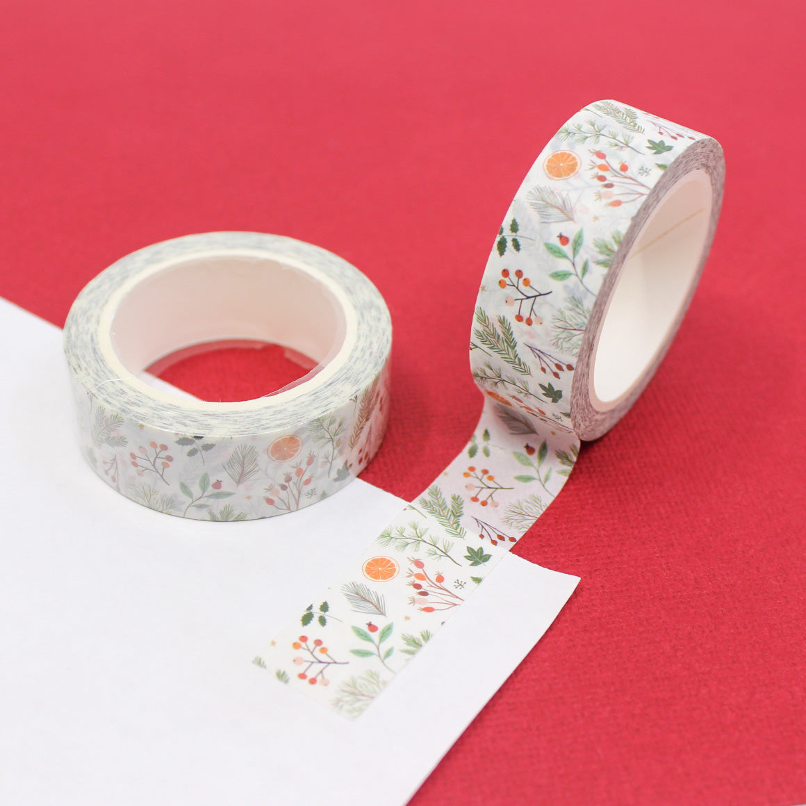 Celebrate the holiday season with this charming washi tape featuring a traditional oranges pattern. The tape's festive design is perfect for adding a touch of warmth and cheer to your holiday-themed projects. This tape is sold at BBB Supplies Craft Shop.