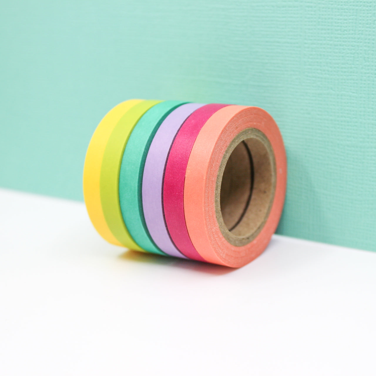 Add a touch of the tropics to your crafts with our Tropical Color Narrow Solid Washi Tape Set. This set includes an array of vibrant and narrow solid color washi tapes, perfect for adding a burst of color and creativity to your projects. This tape is sold at BBB Supplies Craft Shop.