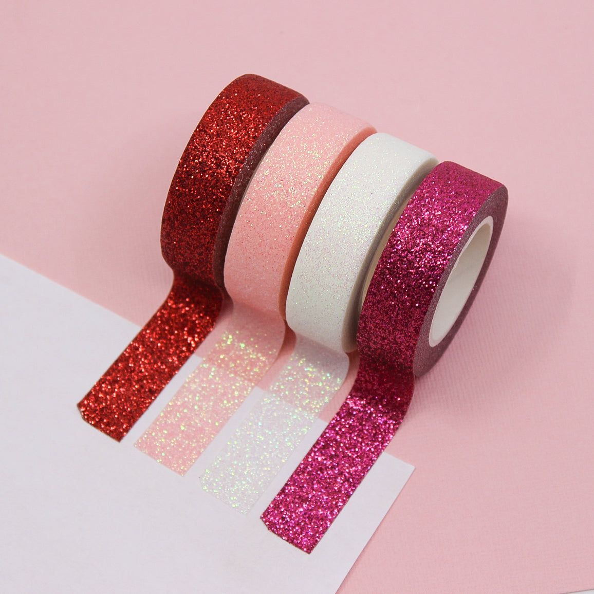 Capture the spirit of love with our Valentine's glitter washi tape, featuring sparkling hearts and romantic motifs in shades of red and pink, perfect for adding a touch of heartfelt sparkle to your crafts. This tape is sold at BBB Supplies Craft Shop.