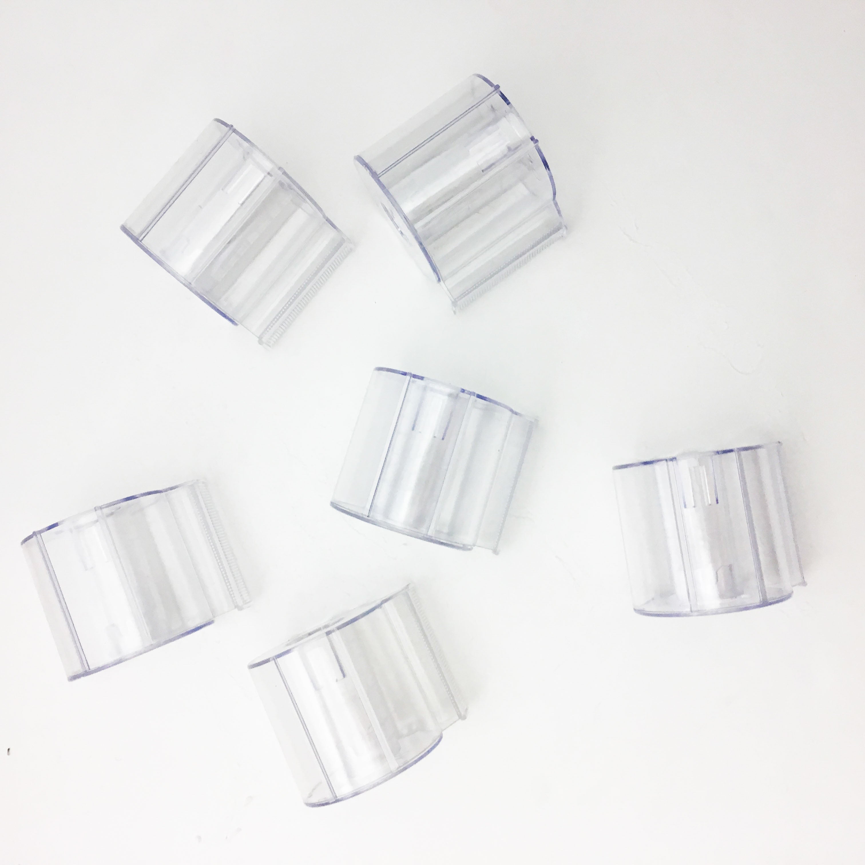 top view of Clear plastic washi tape dispenser with serrated edge for easy cutting