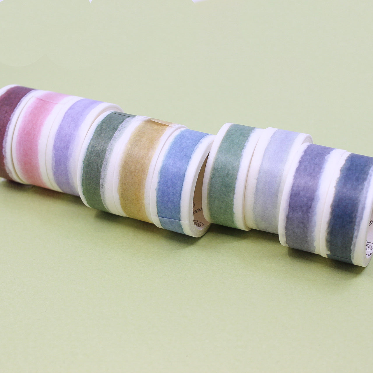 Get creative with our collection of 10 watercolor washi tapes in a beautiful rainbow palette, ideal for scrapbooking, journaling, and DIY crafts. These are especially perfect for easy banners on your spread. This collection is sold at BBB Supplies Craft Shop.
