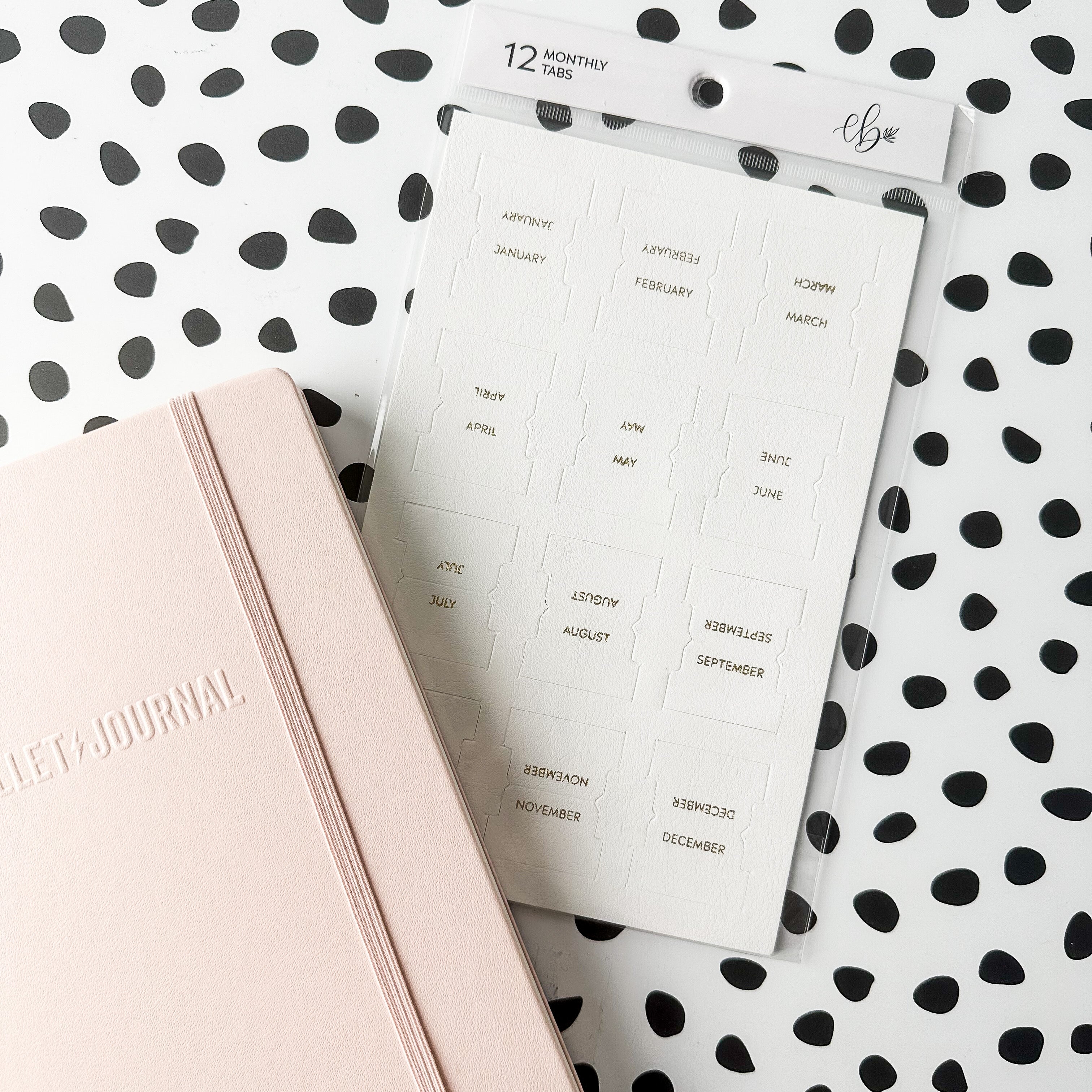 Faux Leather Monthly Tabs: Stylish and functional tabs for organizing your bullet journal or planner. These tabs are from Elyse Breanne Design and sold at BBB Supplies Craft Shop.