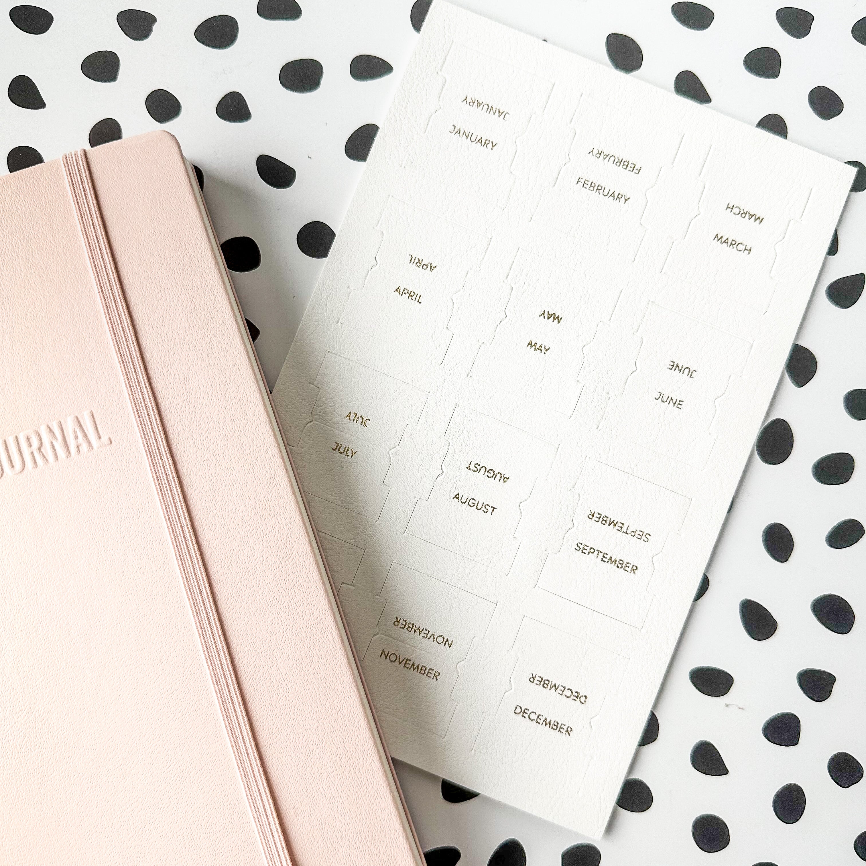 Faux Leather Monthly Tabs: Stylish and functional tabs for organizing your bullet journal or planner. These tabs are from Elyse Breanne Design and sold at BBB Supplies Craft Shop.