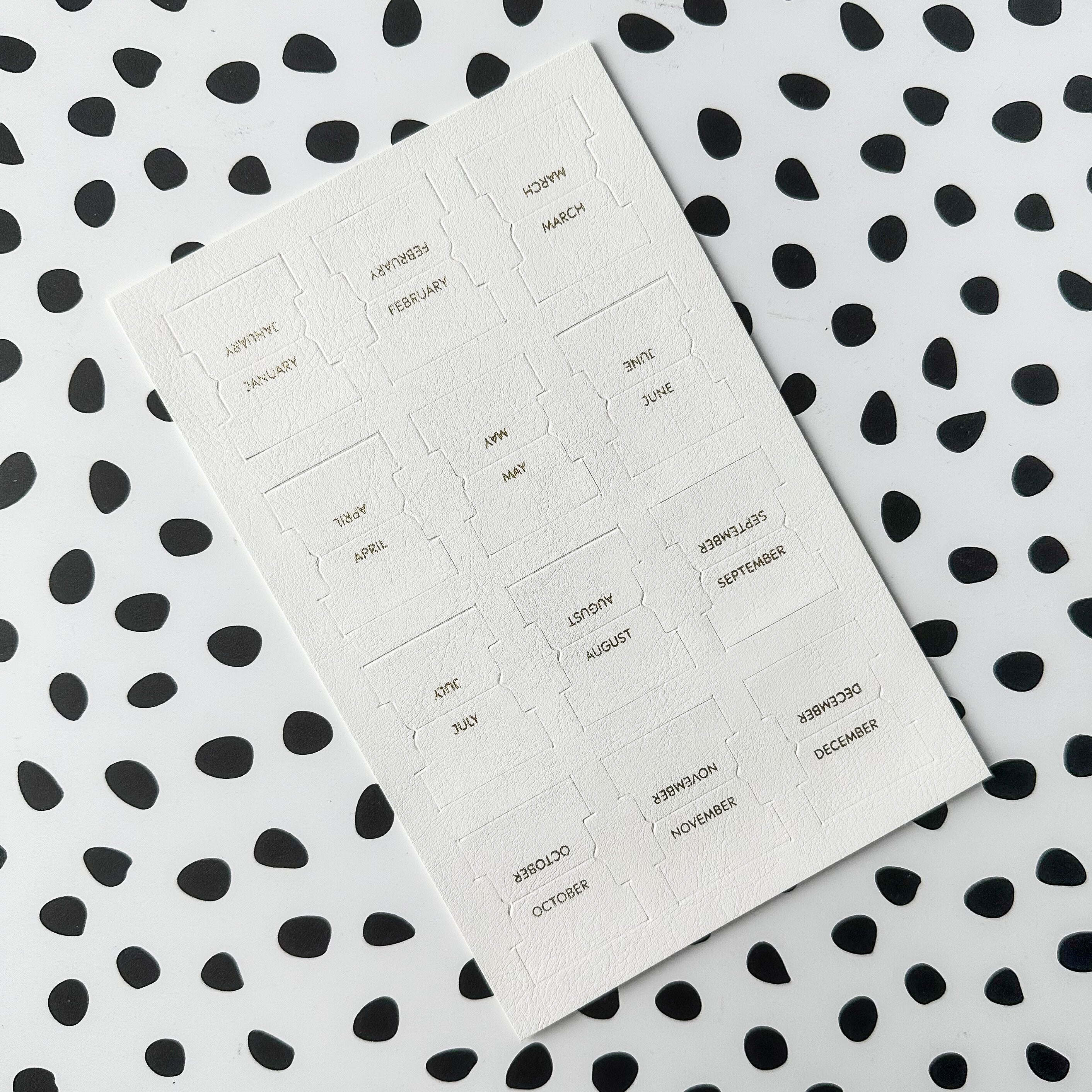 Faux Leather Monthly Tabs: Stylish and functional tabs for organizing your bullet journal or planner. These tabs are from Elyse Breanne Design and sold at BBB Supplies Craft Shop.