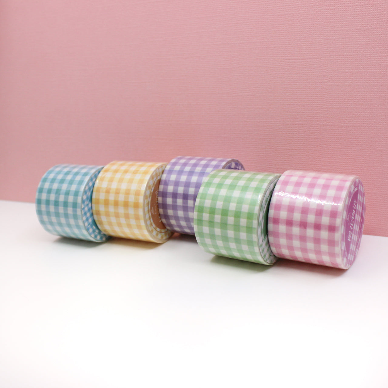 Add a touch of springtime charm to your crafts with our wide plaid washi tape in delightful spring colors, featuring a vibrant and playful plaid pattern perfect for seasonal projects. These tapes are sold at BBB Supplies Craft Shop.
