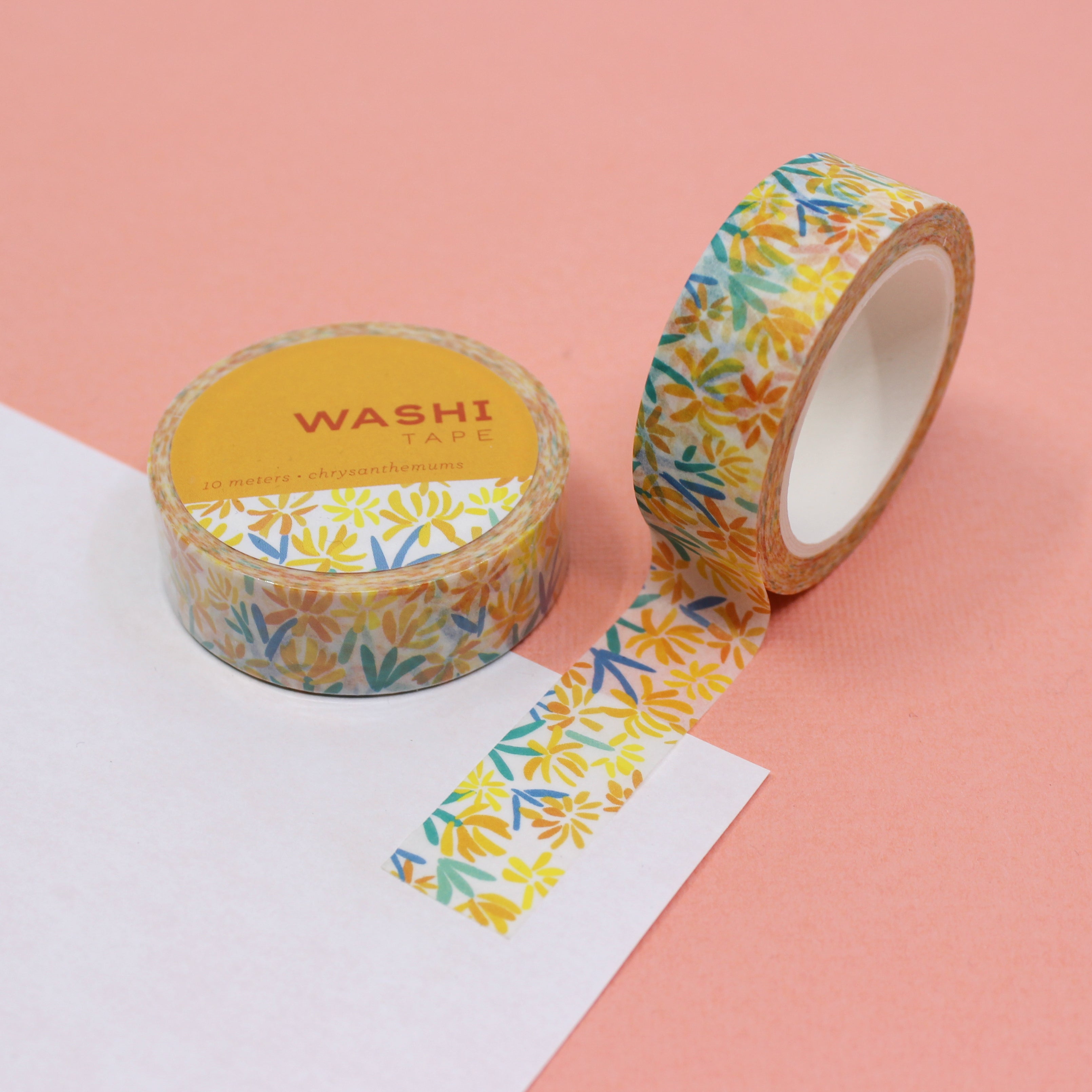 Infuse your creations with the charm of yellow chrysanthemums using our floral washi tape, adorned with delicate flowers that symbolize happiness and well-wishes, adding a cheerful and sunny accent to your crafts. This tape is designed by Girl of All Work and sold at BBB Supplies Craft Shop.