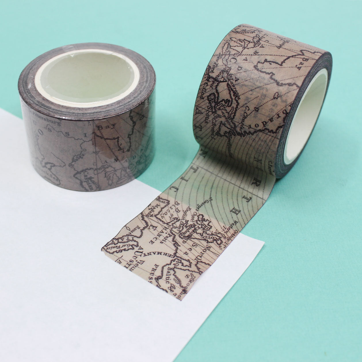 Washi tape featuring an antique world map design, perfect for travel-themed crafts, journaling, and adding a vintage touch to your stationery.