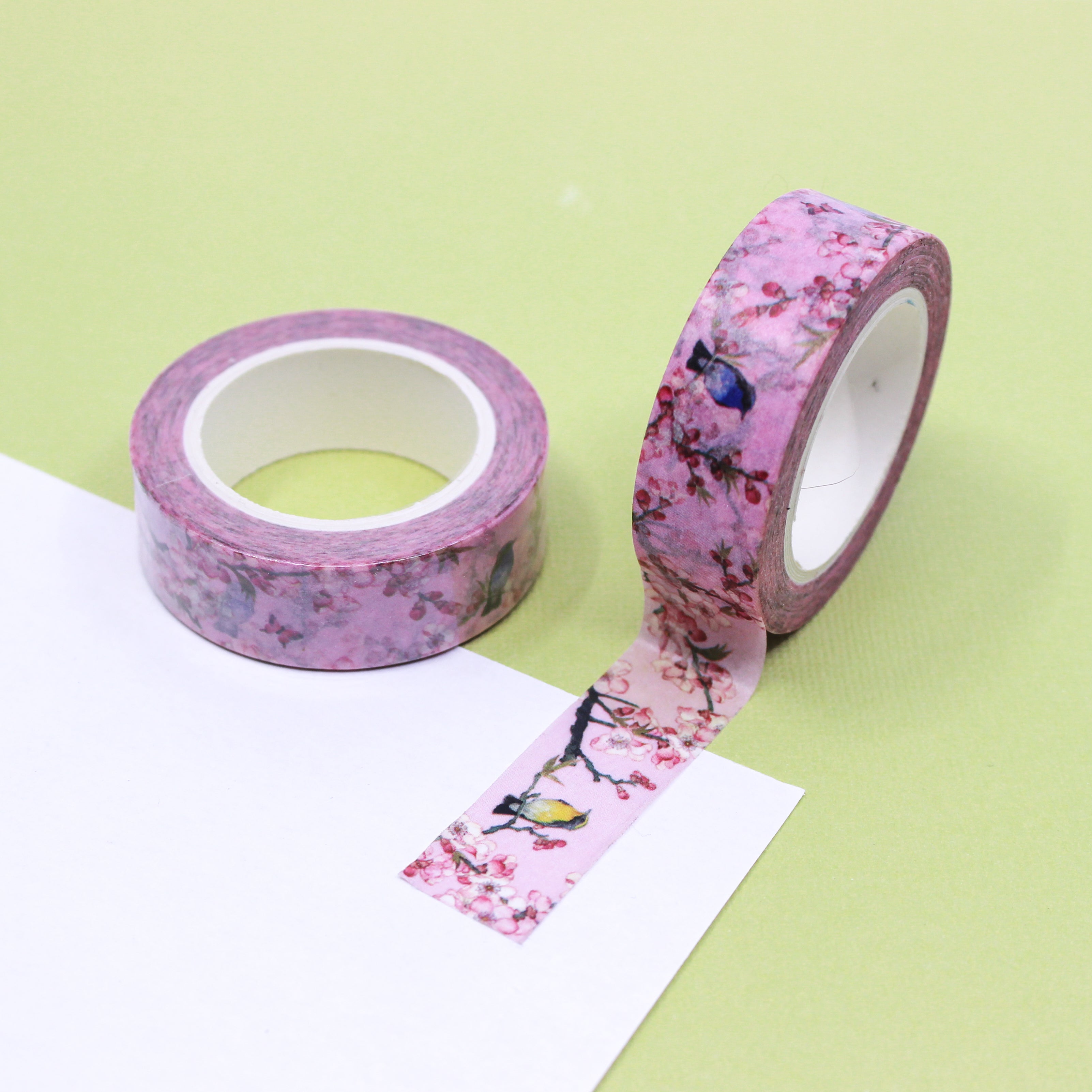 Elevate your crafts with our Birds & Cherry Blossoms Pink Floral Washi Tape, featuring graceful bird and cherry blossom illustrations. Ideal for adding a touch of delicate beauty and serenity to your projects. This tape is sold at BBB Supplies Craft Shop.