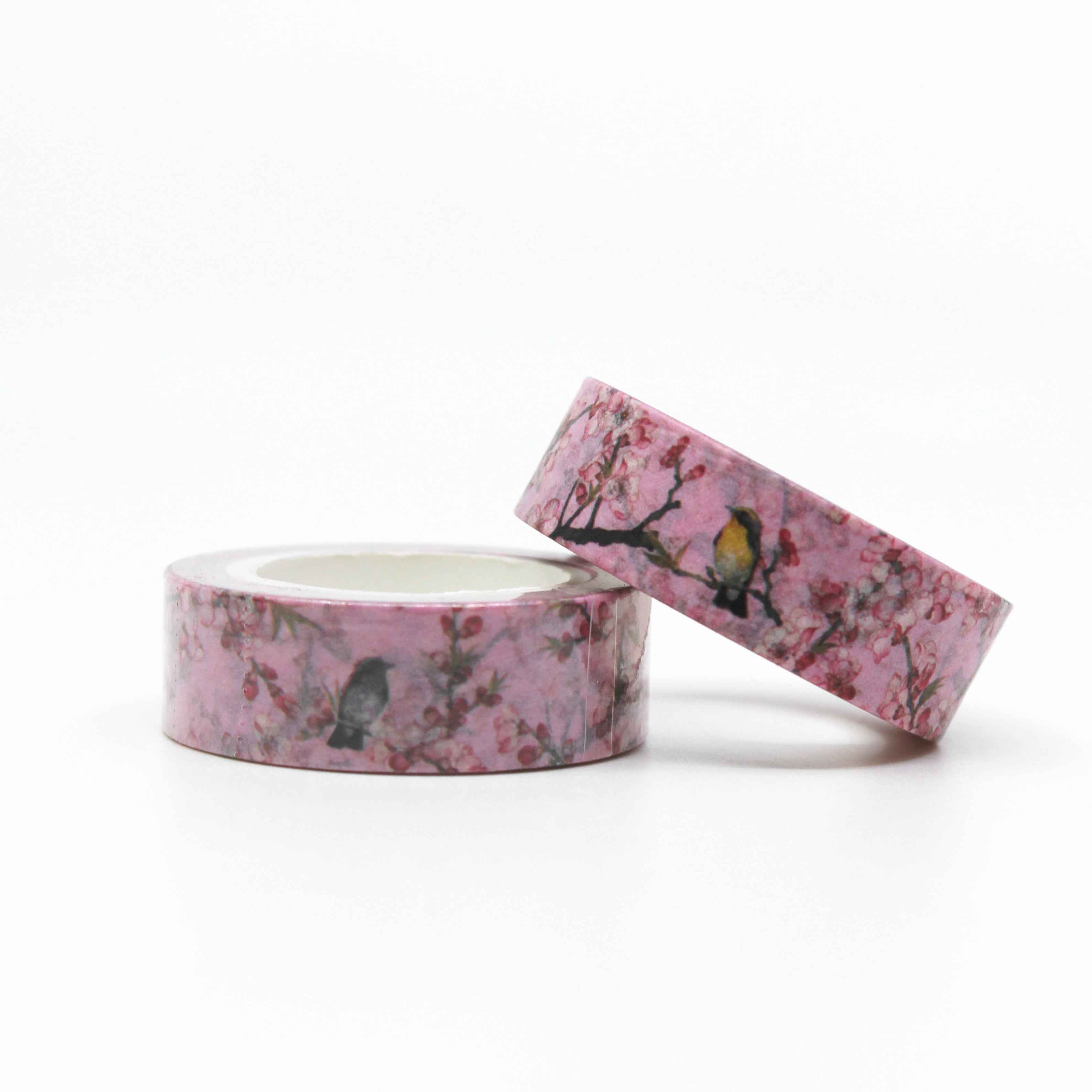 Elevate your crafts with our Birds & Cherry Blossoms Pink Floral Washi Tape, featuring graceful bird and cherry blossom illustrations. Ideal for adding a touch of delicate beauty and serenity to your projects. This tape is sold at BBB Supplies Craft Shop.