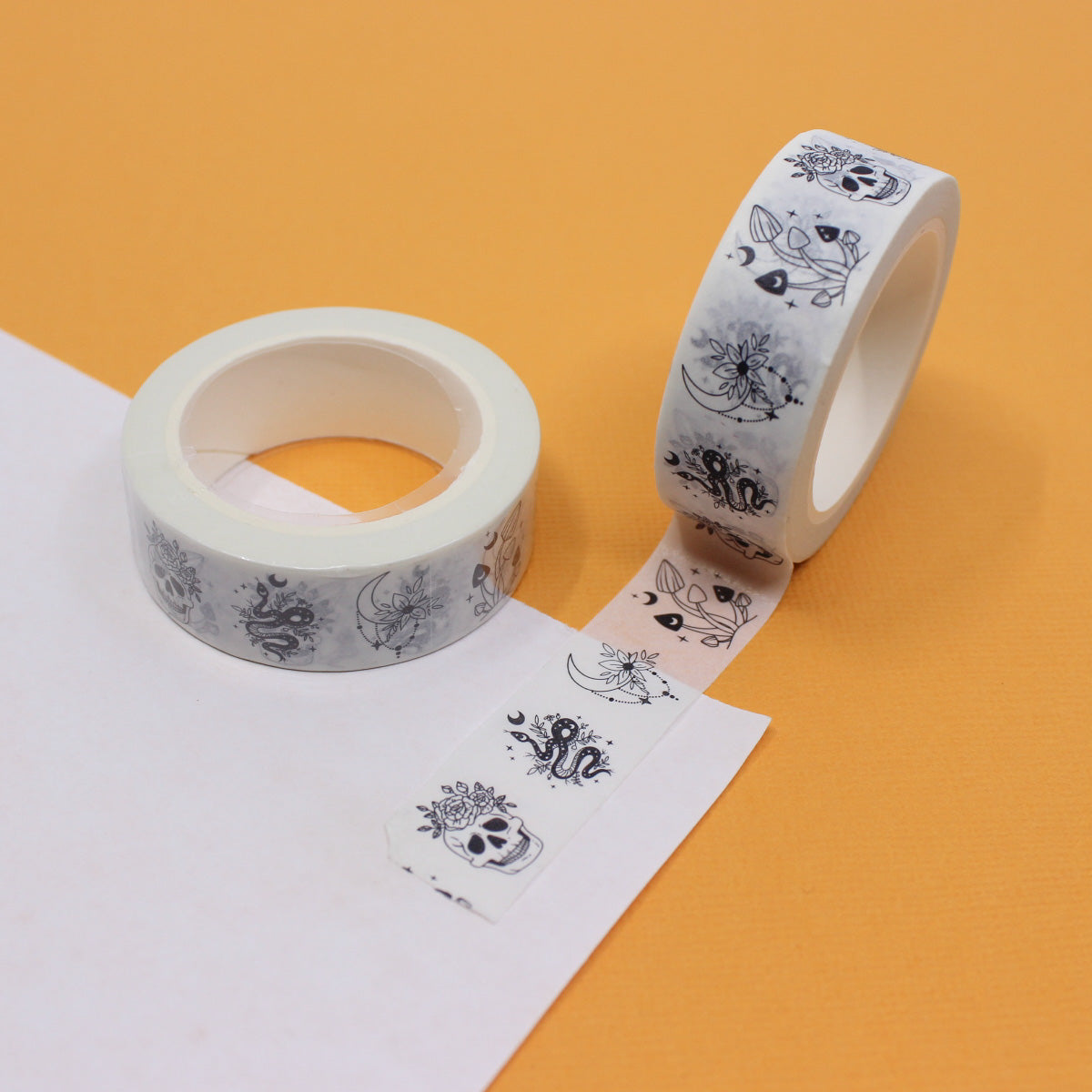 Floral and Skull Washi Tape, a unique design with colorful flowers and intricately detailed skulls, a blend of nature and the macabre. This tape is sold at BBB Supplies Craft Shop.