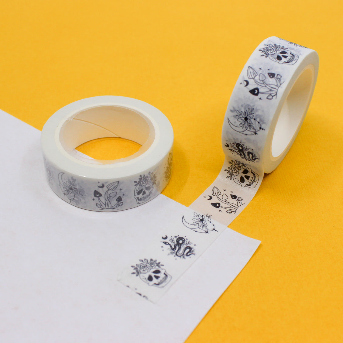 Floral and Skull Washi Tape, a unique design with colorful flowers and intricately detailed skulls, a blend of nature and the macabre. This tape is sold at BBB Supplies Craft Shop.