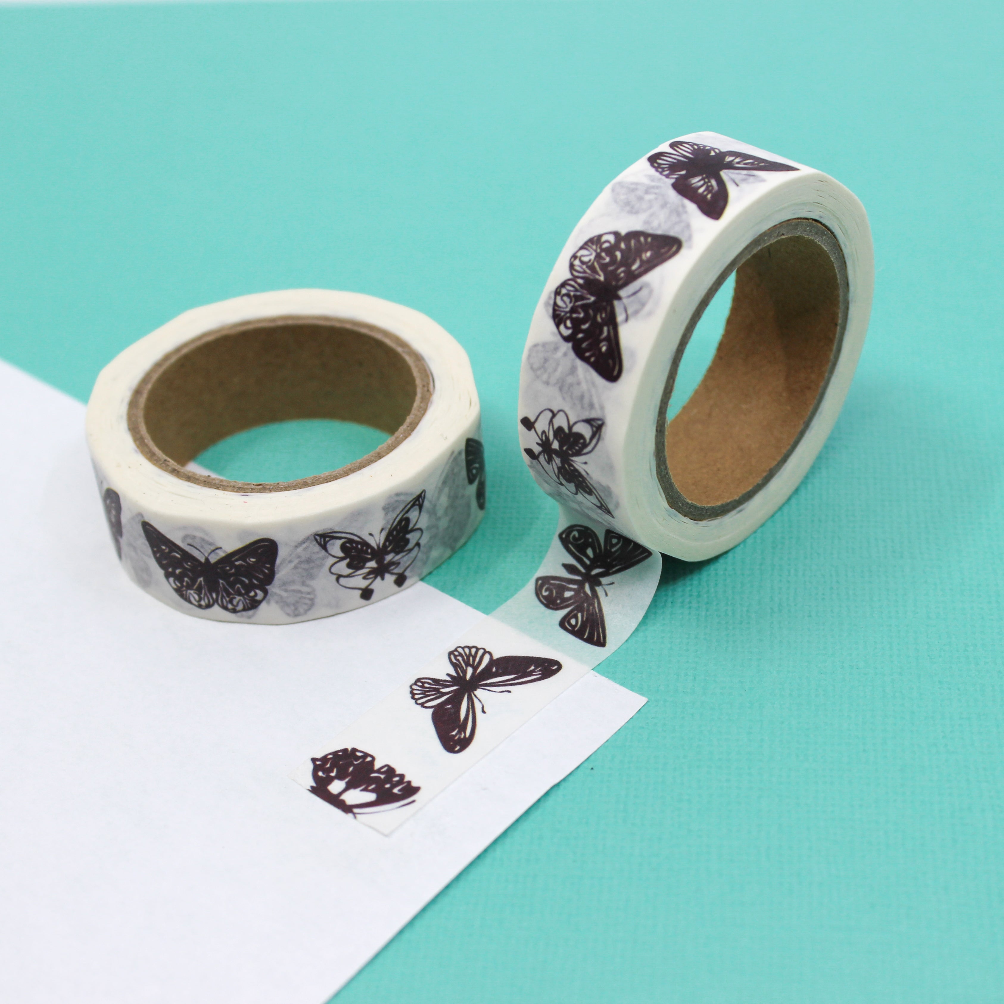 Enhance your crafts with our elegant black and white butterfly washi tape, featuring delicate and minimalist butterfly designs for a touch of simplicity and sophistication. This tape is sold at BBB Supplies Craft Shop.
