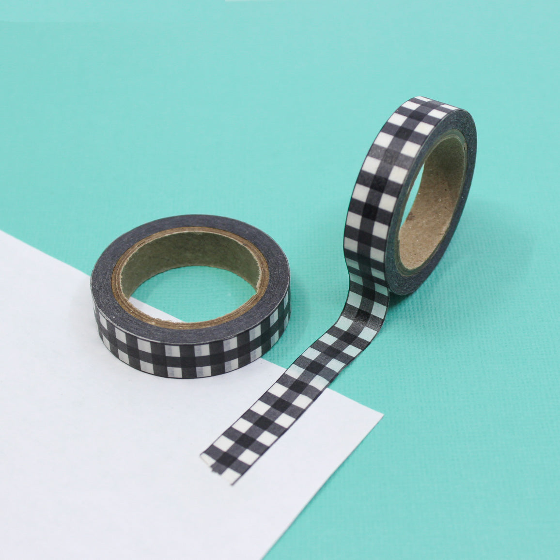 Elevate your crafts with our black and white farmhouse plaid washi tape, featuring a charming plaid pattern reminiscent of classic farmhouse decor, perfect for adding a touch of rustic elegance to your projects. This tape is sold at BBB Supplies Craft Shop.