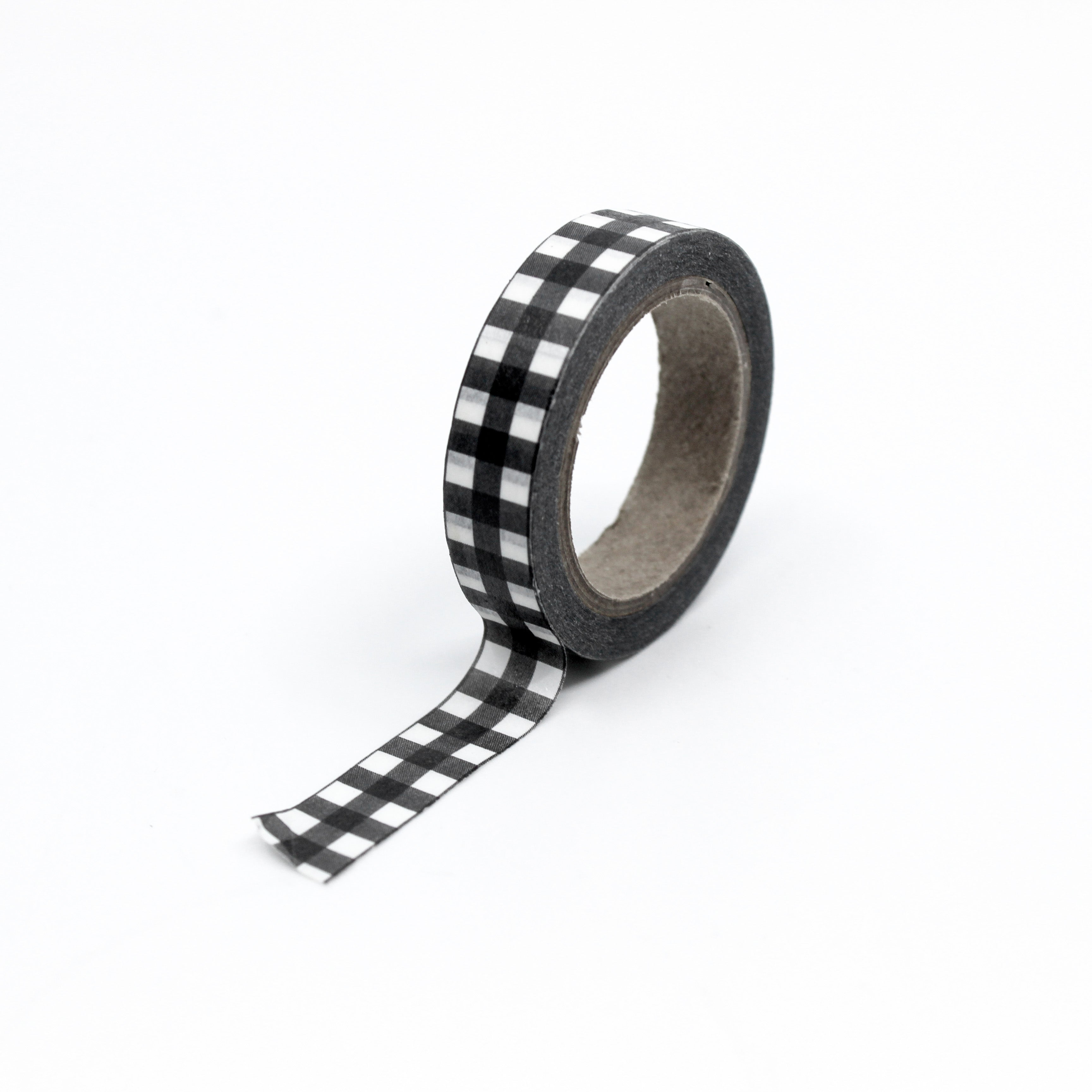 Elevate your crafts with our black and white farmhouse plaid washi tape, featuring a charming plaid pattern reminiscent of classic farmhouse decor, perfect for adding a touch of rustic elegance to your projects. This tape is sold at BBB Supplies Craft Shop.