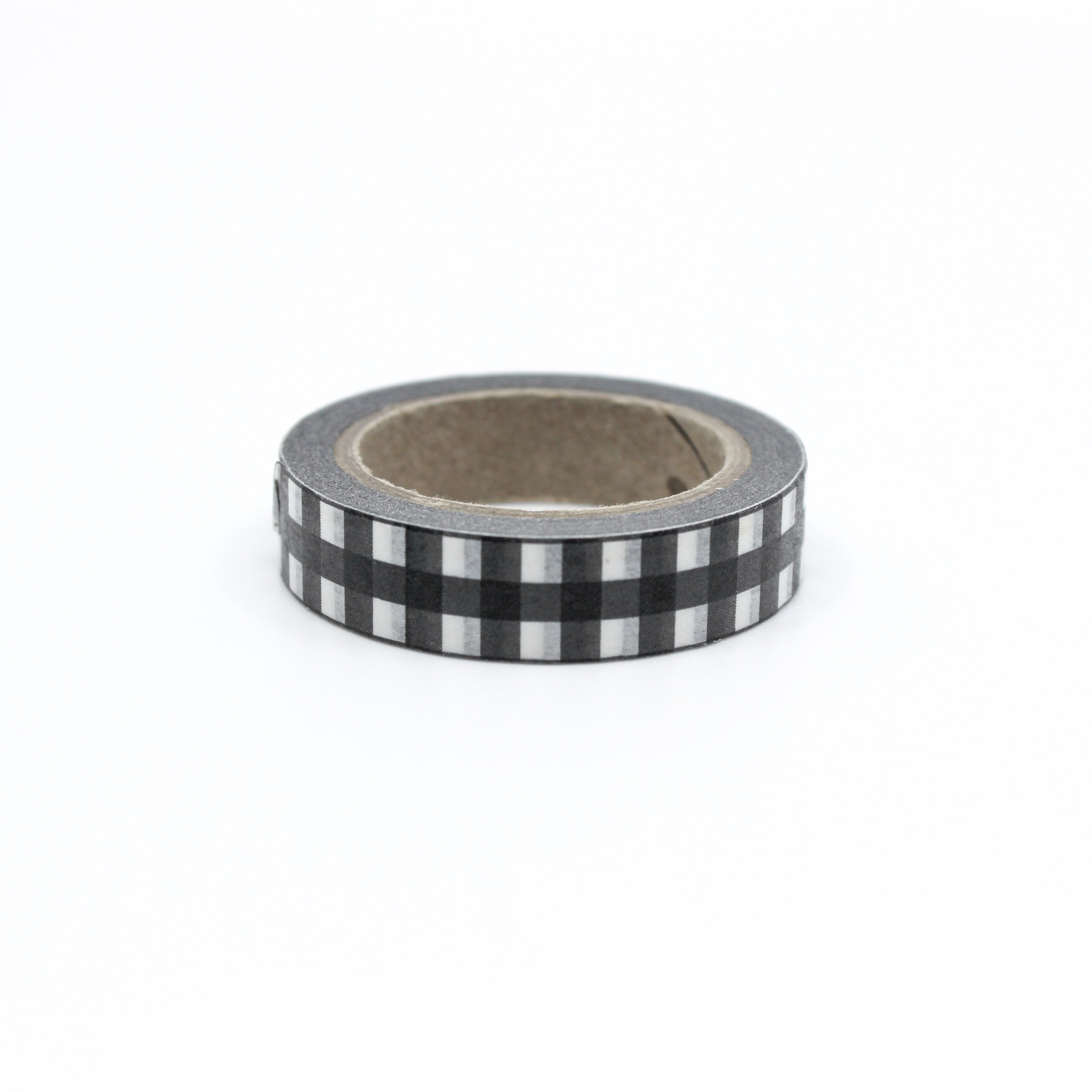 Elevate your crafts with our black and white farmhouse plaid washi tape, featuring a charming plaid pattern reminiscent of classic farmhouse decor, perfect for adding a touch of rustic elegance to your projects. This tape is sold at BBB Supplies Craft Shop.
