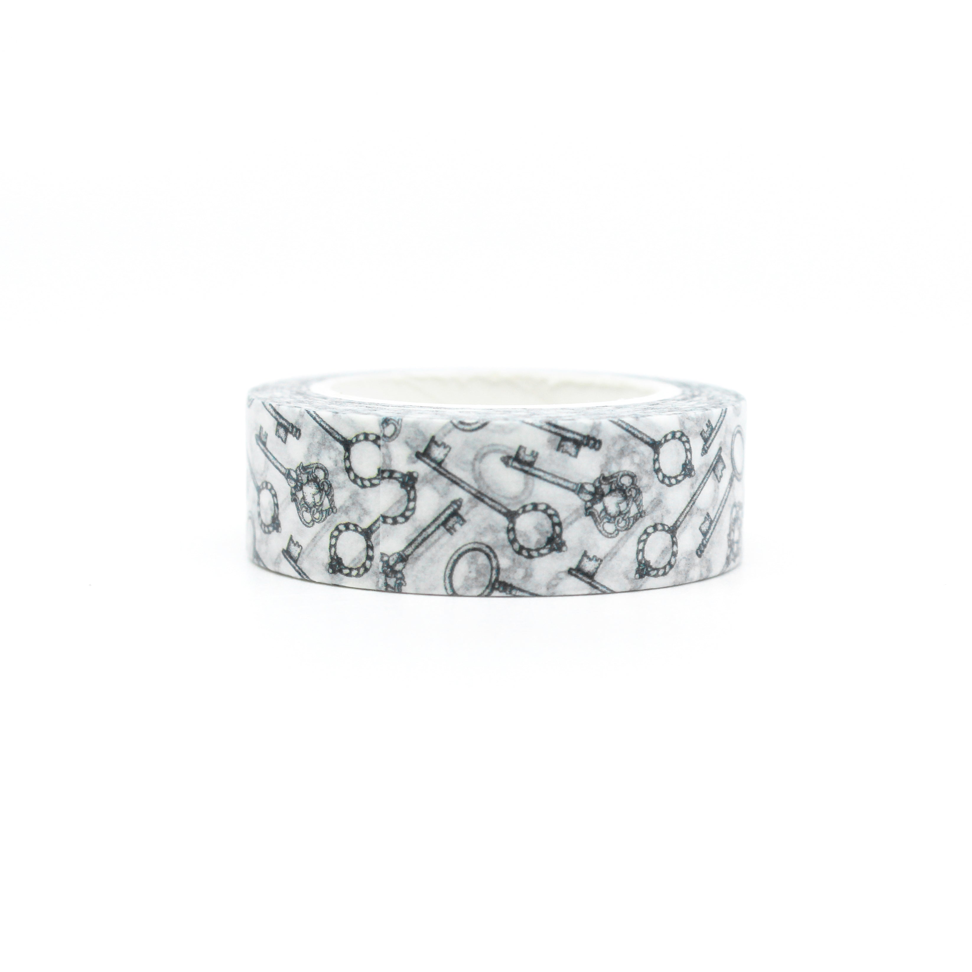 Unlock your creativity with our captivating black and white key washi tape, featuring an intricate key pattern for a touch of mystery and elegance. This tape is sold at BBB Supplies Craft Shop.