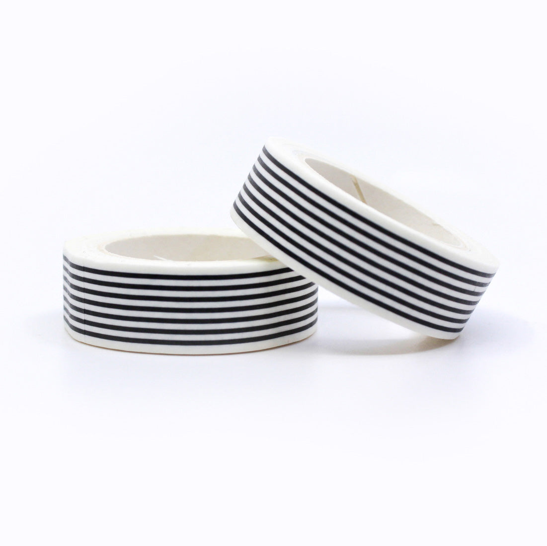 Add a timeless touch to your projects with our Classic Black & White Stripe Washi Tape, featuring a stylish and versatile stripe pattern. Ideal for creating a sleek and sophisticated look. This tape is sold at BBB Supplies Craft Shop.