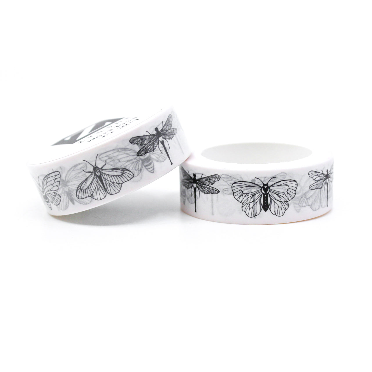 Captivating black and white insect design washi tape featuring moths, butterflies, and dragonflies. Let your creativity take flight as you embrace the allure of these enchanting insects. This tape is sold at BBB Supplies Craft Shop.