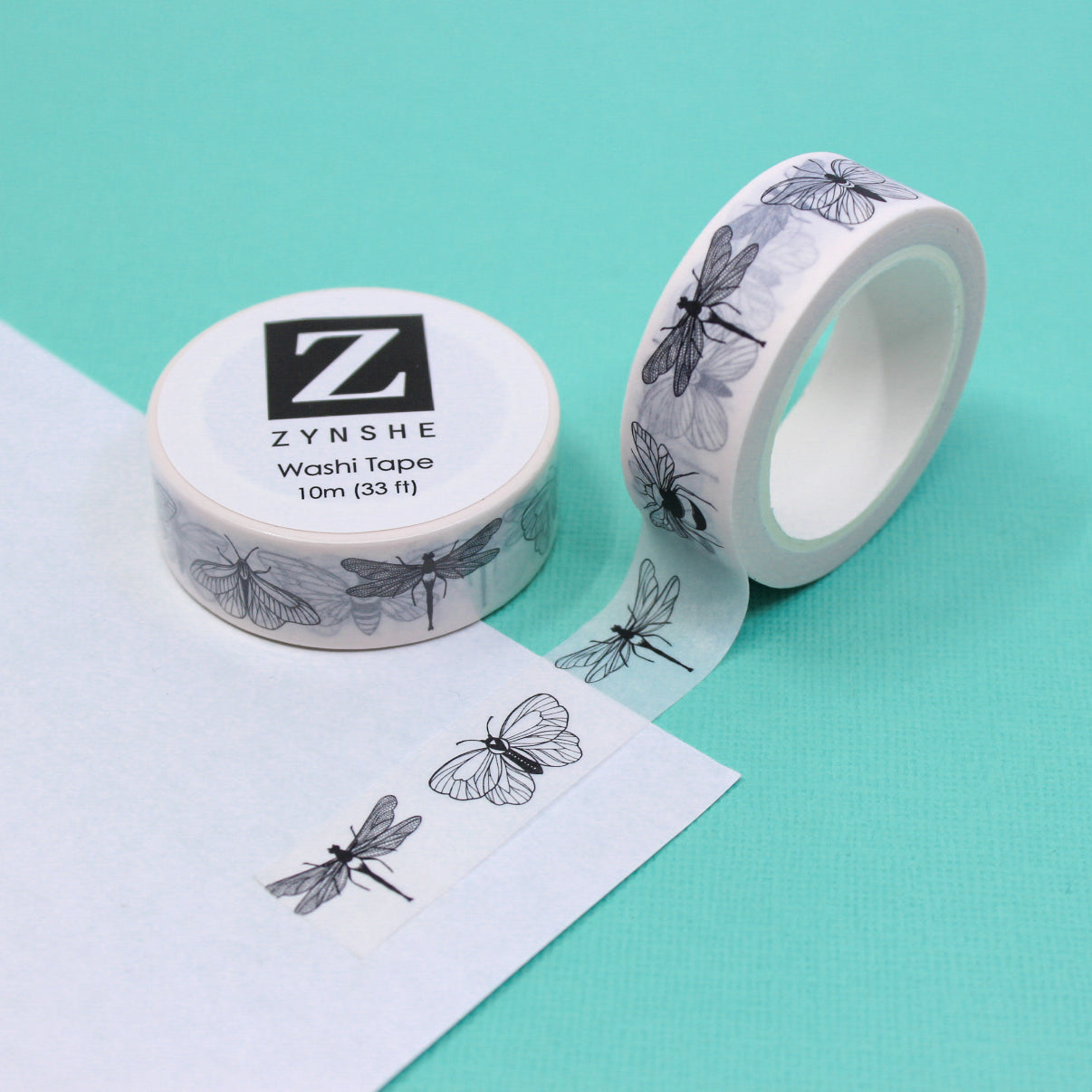Captivating black and white insect design washi tape featuring moths, butterflies, and dragonflies. Let your creativity take flight as you embrace the allure of these enchanting insects. This tape is sold at BBB Supplies Craft Shop.