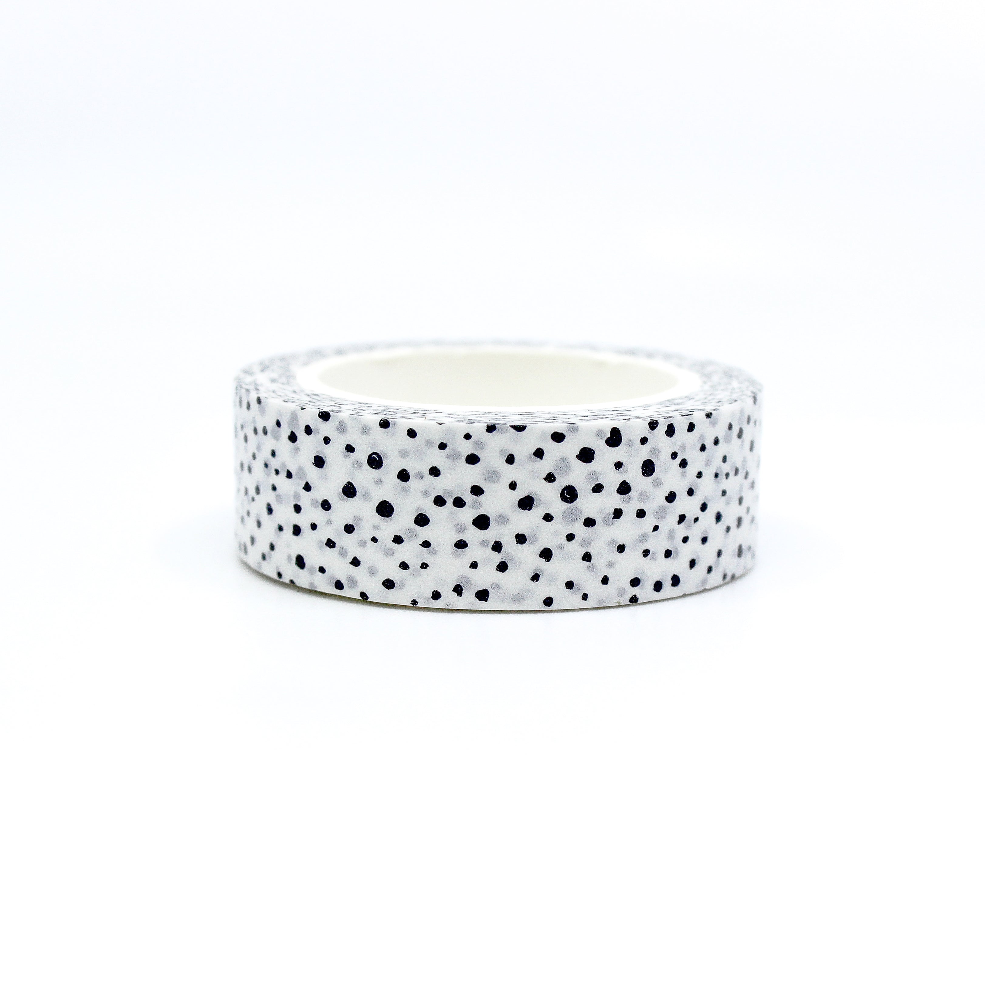 Elevate your projects with our captivating white tiny speckle washi tape, showcasing a fine pattern of small white speckles, adding a subtle texture and depth to your designs. This tape is sold at BBB Supplies Craft Shop.
