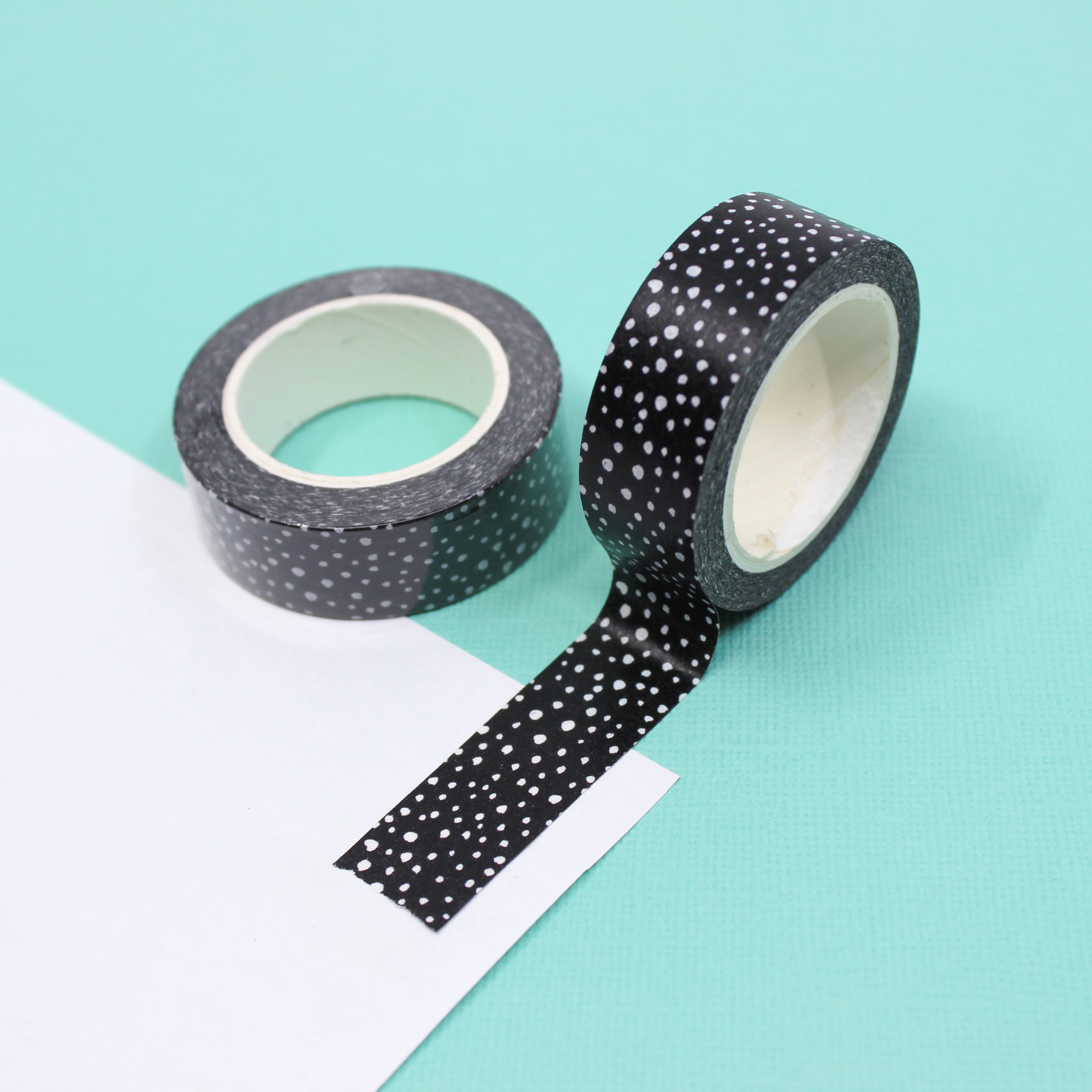 Add a subtle and modern touch to your crafts with our tiny speckles black washi tape, featuring delicate and scattered speckles in black for a minimalist and contemporary look. This tape is sold at BBB Supplies Craft Shop.