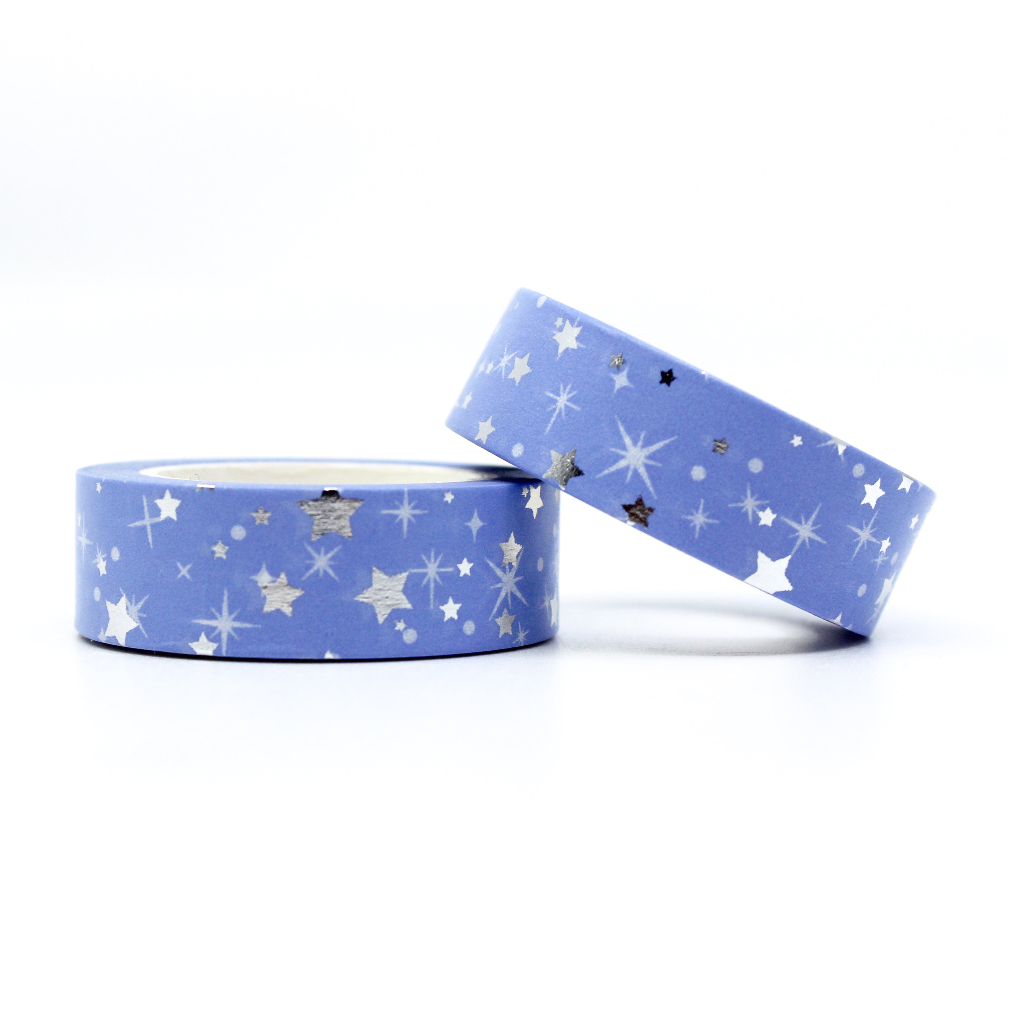 Elevate your crafts with our Blue Silver Foil Stars Washi Tape, featuring a celestial design with shimmering silver foil stars against a rich blue background. Ideal for adding a touch of cosmic elegance to your projects. This tape is sold at BBB Supplies Craft Shop.