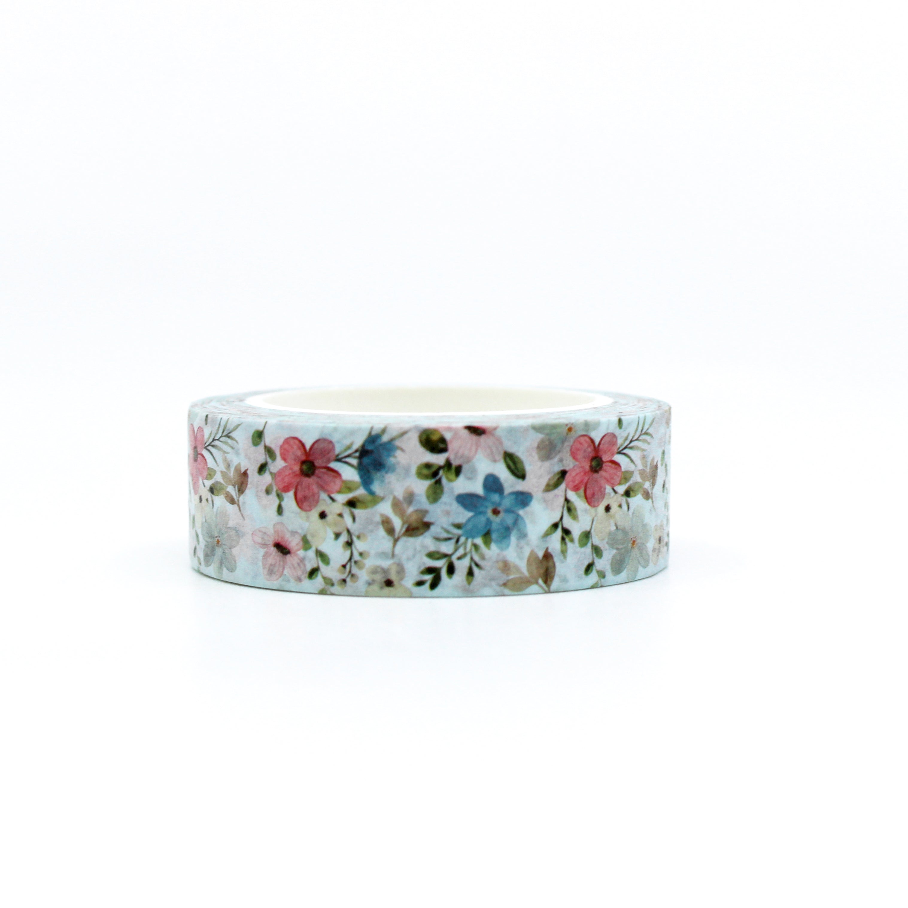 Spring Blue Floral Washi Tape: Bring the beauty of spring to your crafts with our Blue Floral Washi Tape. Featuring delicate blue flowers on a white background, this tape is perfect for adding a touch of elegance to your projects. Whether you're scrapbooking memories, decorating cards, or embellishing journals, this tape is sure to inspire your creativity. This tape is sold at BBB Supplies Craft Shop.