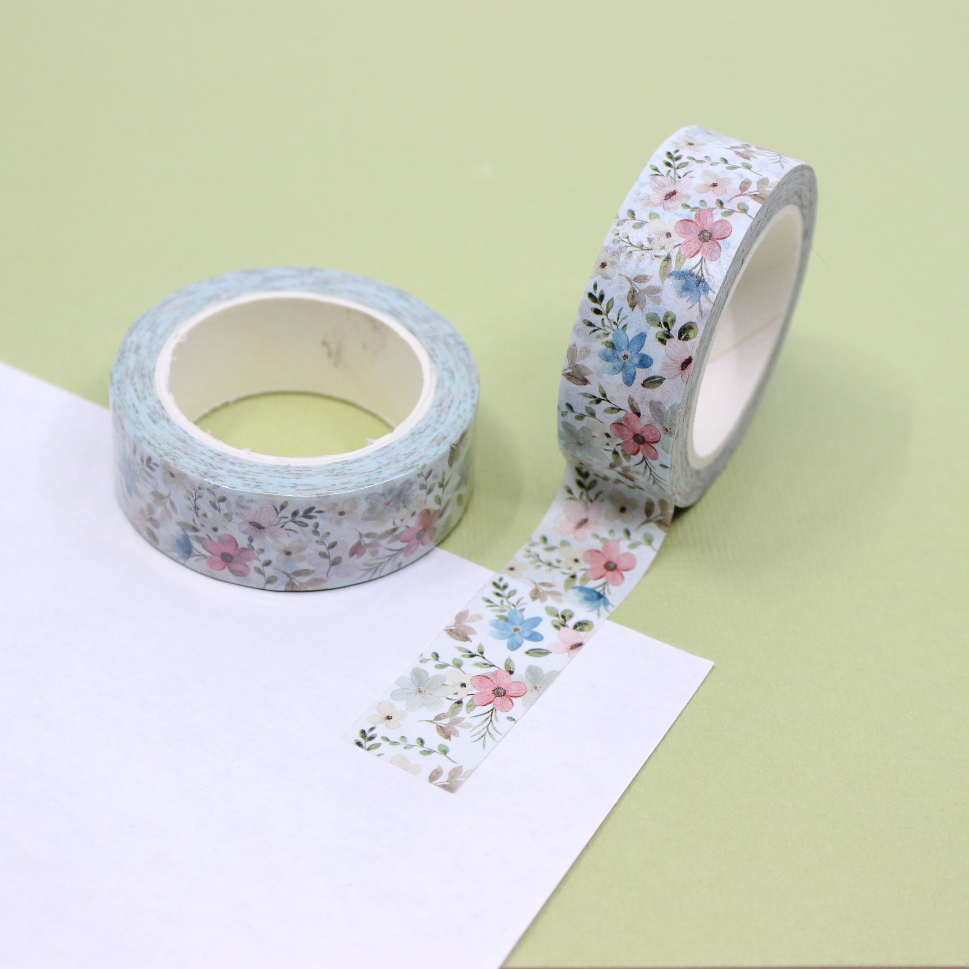 Spring Blue Floral Washi Tape: Bring the beauty of spring to your crafts with our Blue Floral Washi Tape. Featuring delicate blue flowers on a white background, this tape is perfect for adding a touch of elegance to your projects. Whether you're scrapbooking memories, decorating cards, or embellishing journals, this tape is sure to inspire your creativity. This tape is sold at BBB Supplies Craft Shop.
