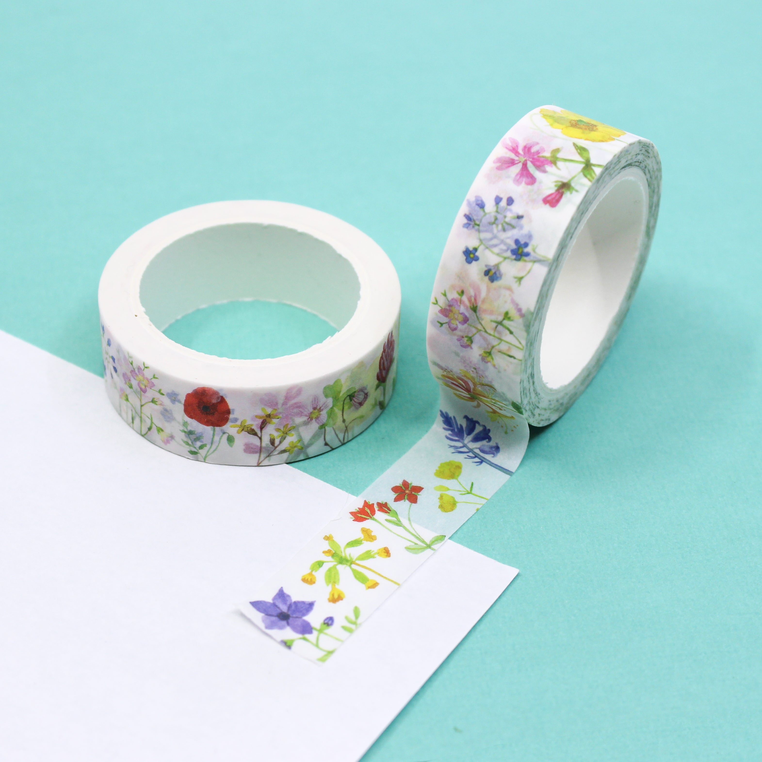 Elevate your crafts with our British Floral Washi Tape, adorned with a delightful pattern of native British flowers. Perfect for adding a touch of natural beauty and elegance to your projects. This tape is designed by Sarah Francis and sold at BBB Supplies Craft Shop.