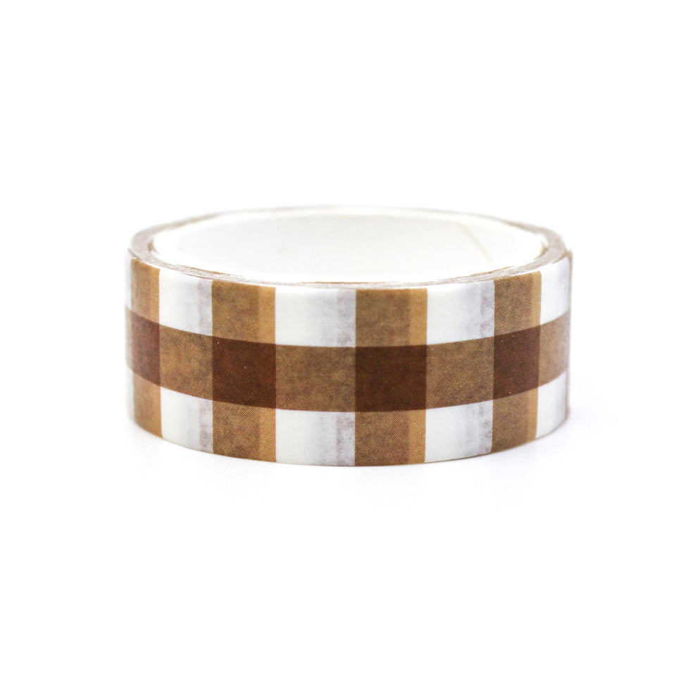 Add a rustic touch to your projects with this brown plaid washi tape. Perfect for scrapbooking, card making, or decorating journals and planners. This washi tape is sold at BBB Supplies Craft Shop.