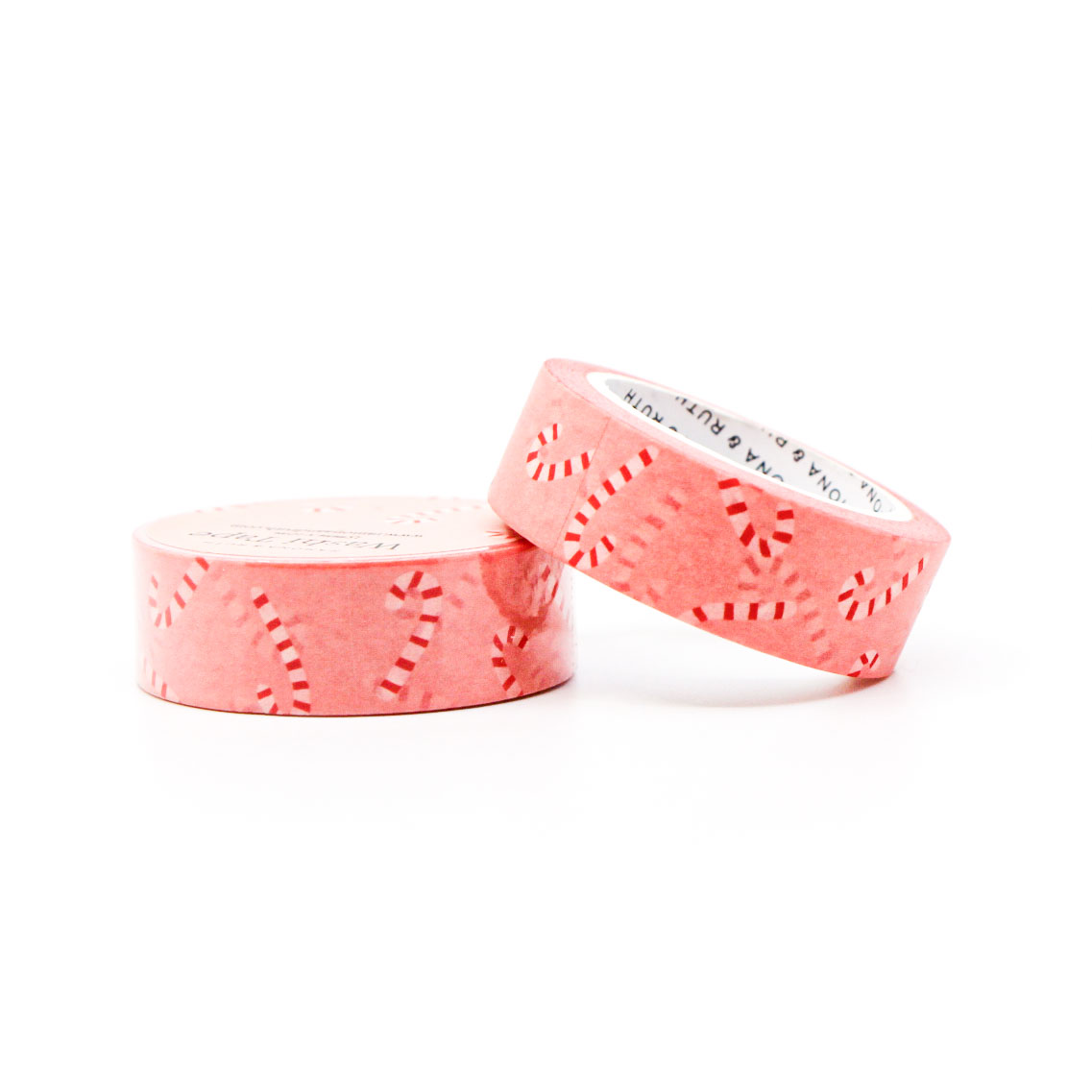 Red and white candy cane washi tape with soft pink festive background