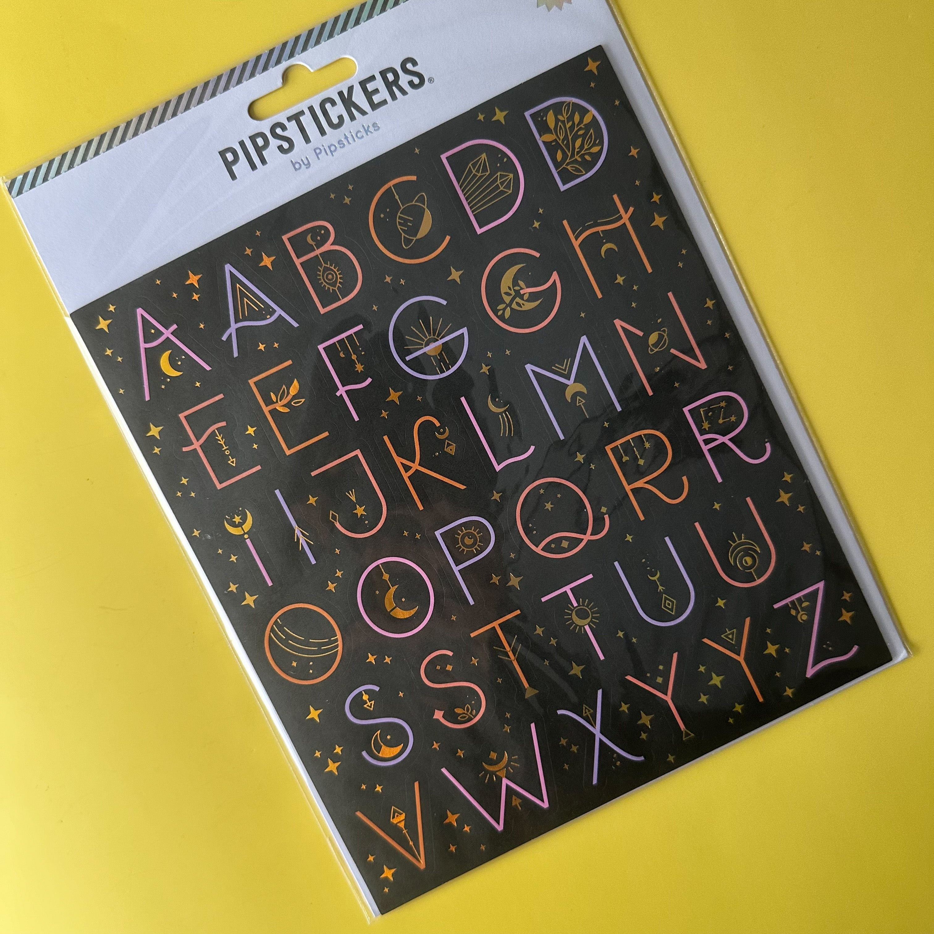 The Celestial Moon and Stars Letters Sticker Sheet adds a mystical and enchanting touch to your planner, journal, or craft projects using these celestial letters with moon, stars, and mystic accents.