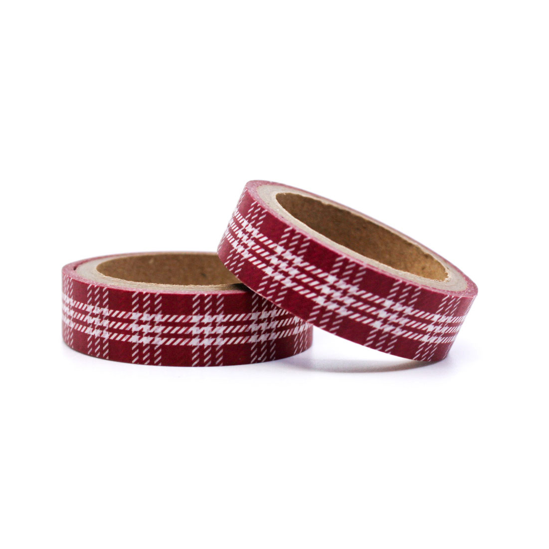 wo rolls of plaid decorative tape displayed on a red surface.