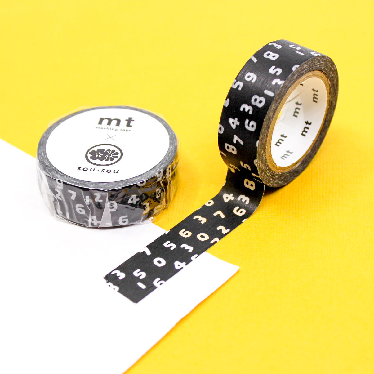 Elevate your projects with our captivating fun numbers washi tape, featuring charming numerical designs in a choice of classic black and white or a lively rainbow palette, creating dynamic and eye-catching elements. This black numbers tape is from MT Brand Washi Tape and sold at BBB Supplies Craft Shop.