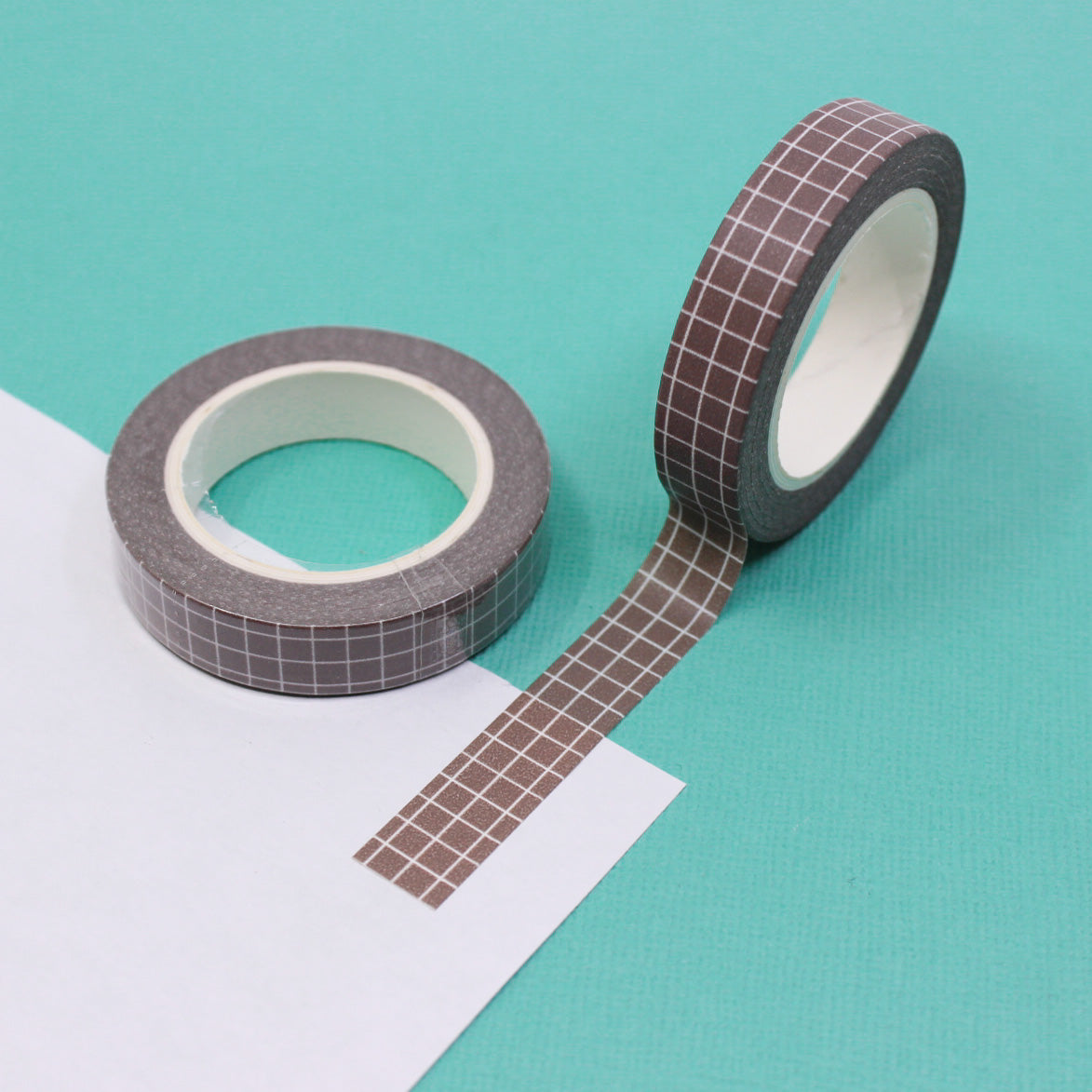 This brown narrow grid tape is functional and decorative, making it a must have for any planner, journal or calendar. These tapes are sold at BBB Supplies Craft Shop.