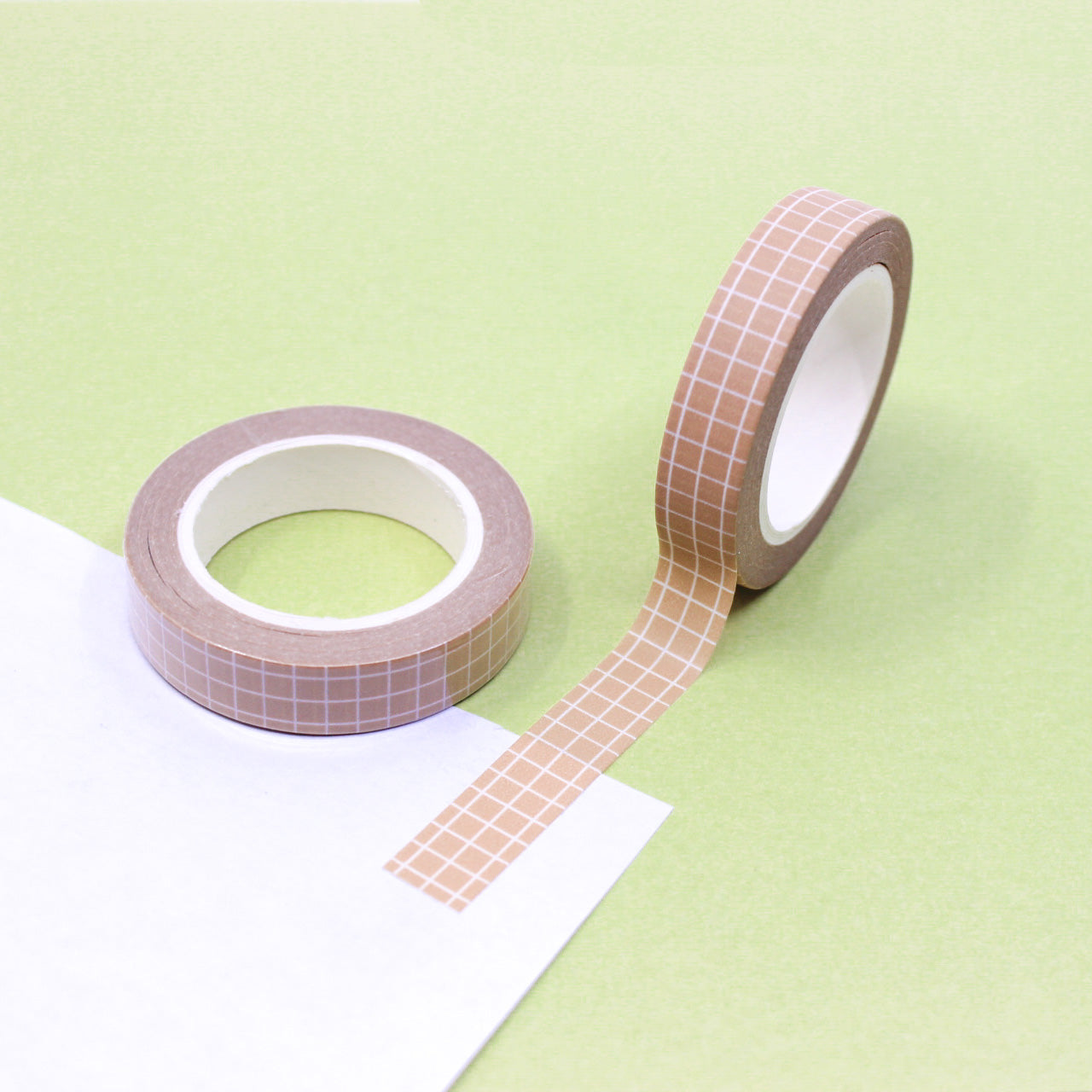 This peachy brown narrow grid tape is functional and decorative, making it a must have for any planner, journal or calendar. These tapes are sold at BBB Supplies Craft Shop.