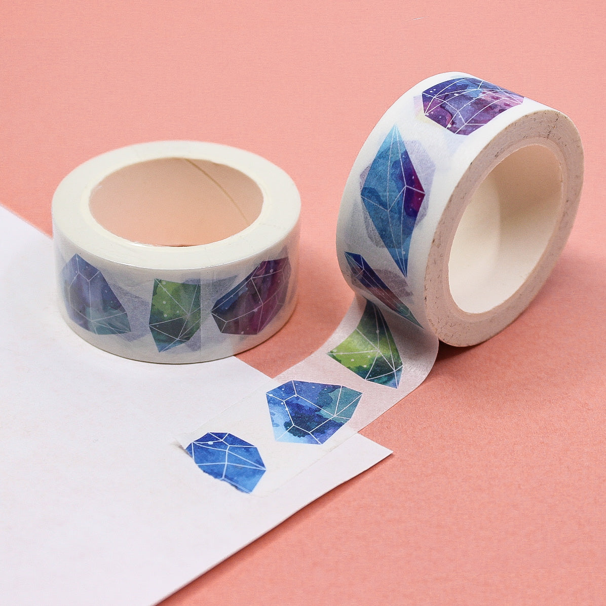 Add a touch of natural beauty to your crafts with this colorful gemstone geode washi tape. Featuring a stunning geode design in vibrant colors, this tape is perfect for decorating journals, scrapbooks, and more. This tape is sold at BBB Supplies Craft Shop.