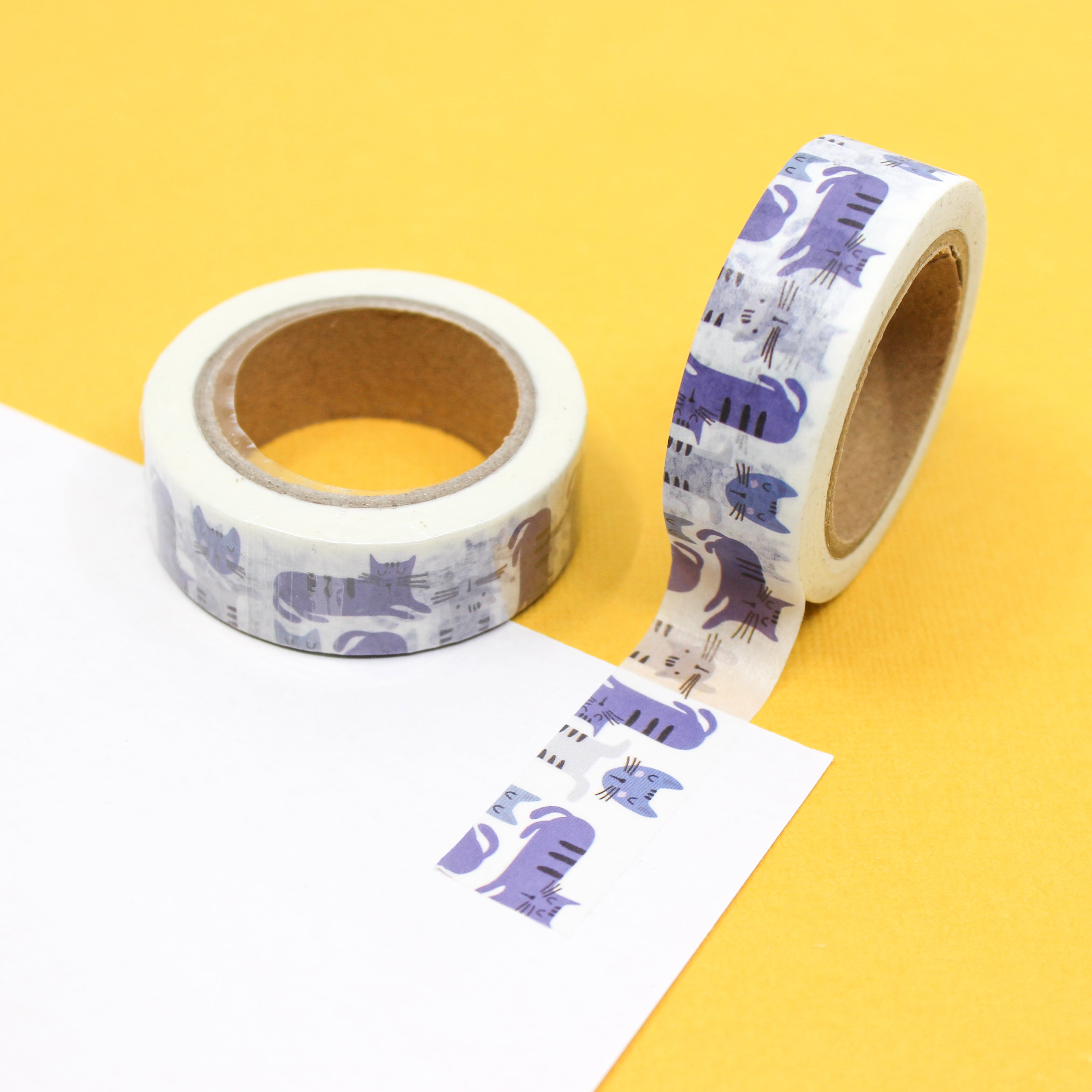 Infuse your crafts with cool feline vibes using our Cool Blue Cat Washi Tape, featuring a stylish cat design in calming shades of blue. Perfect for adding a touch of sophistication to your projects. This tape is sold at BBB Supplies Craft Shop.