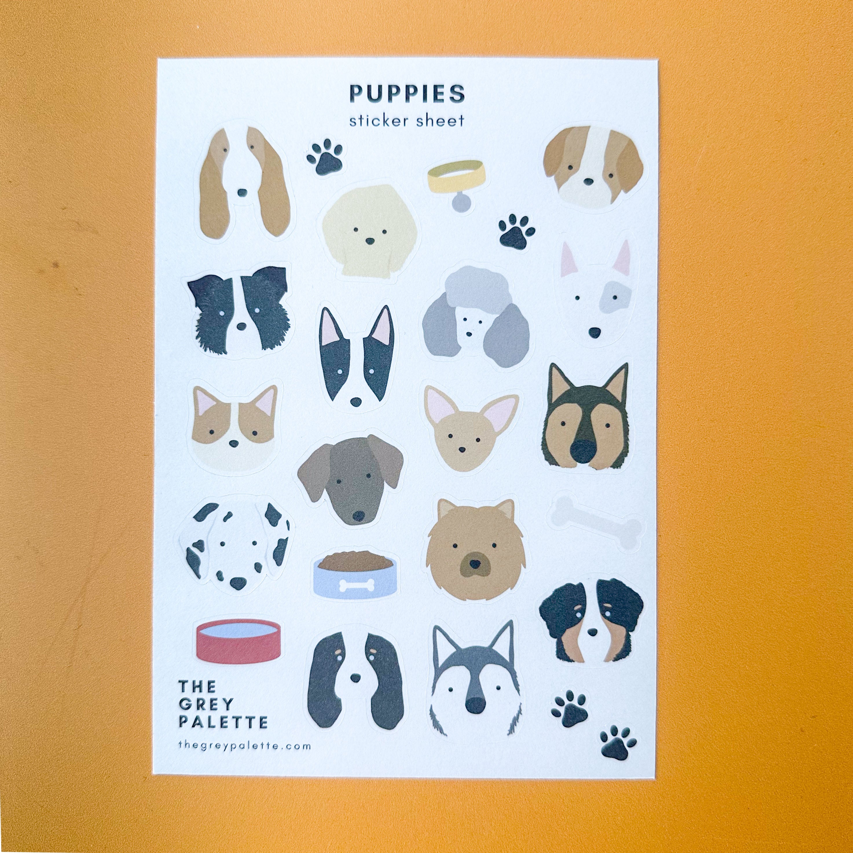 Dog Pups Sticker Sheet featuring various cute dog breeds and playful puppy illustrations for journals, planners, and craft projects.
