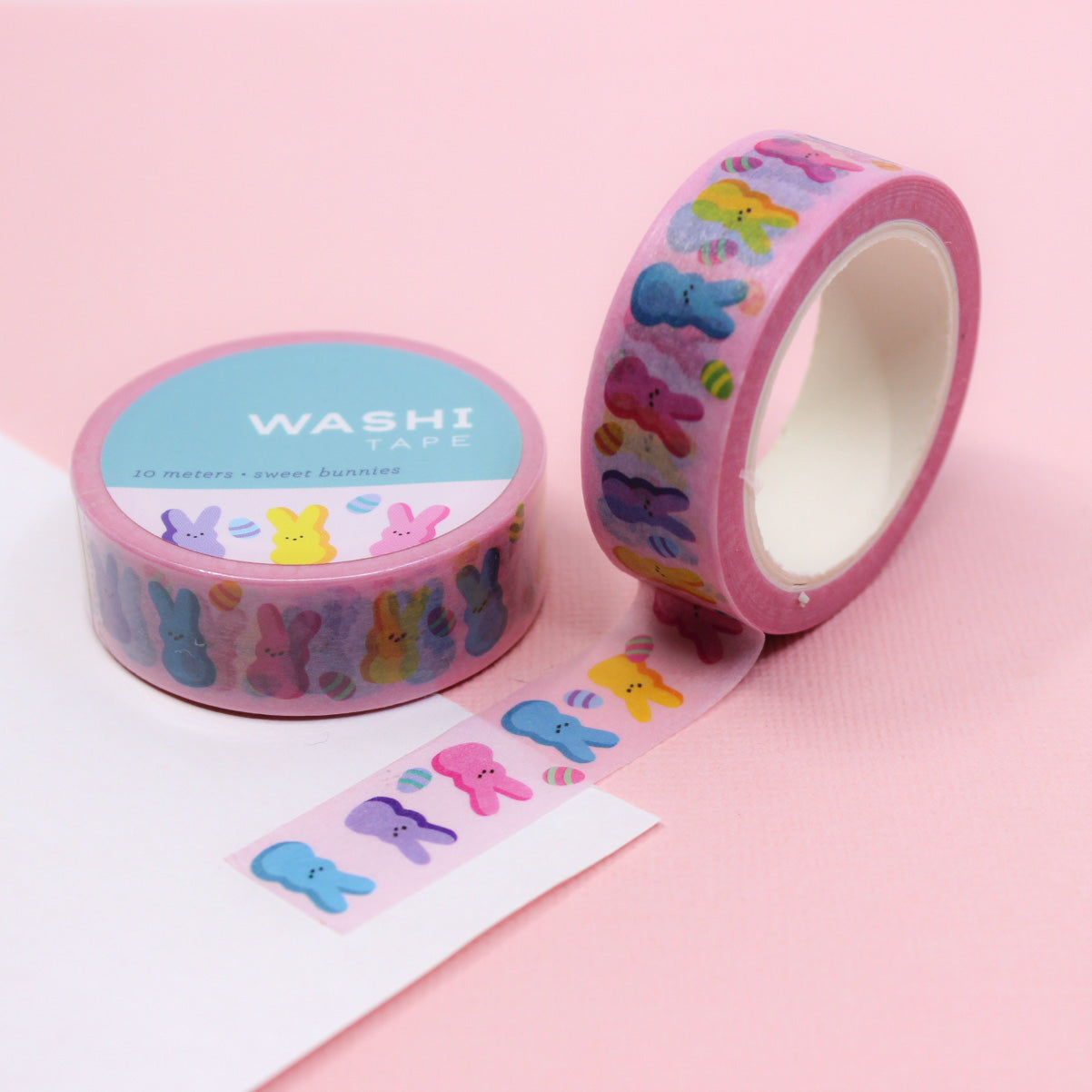 Add a sweet and whimsical touch to your Easter crafts with this delightful washi tape featuring cute bunnies and colorful candies. Perfect for decorating Easter cards, gift wrapping, and more. This tape is designed by Girl of Work and sold at BBB Supplies Craft Shop.