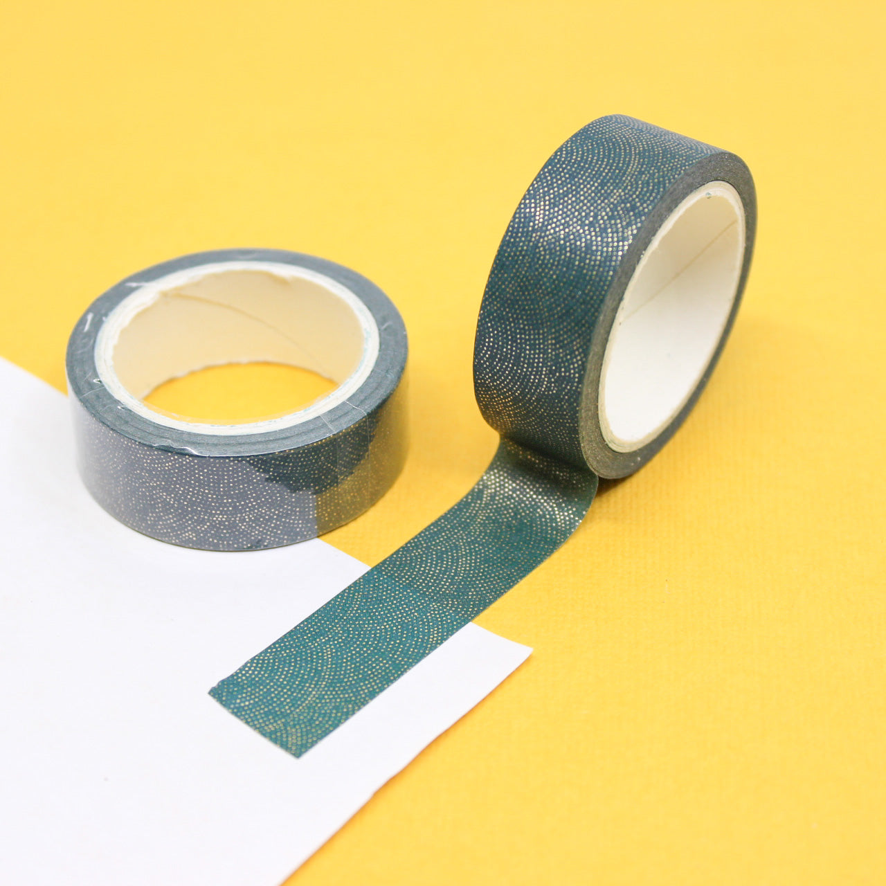 A sophisticated washi tape adorned with shimmering gold foil dots, ideal for enhancing your planners, journals, and DIY projects with a touch of luxury. This tape is sold at BBB Supplies Craft Shop.