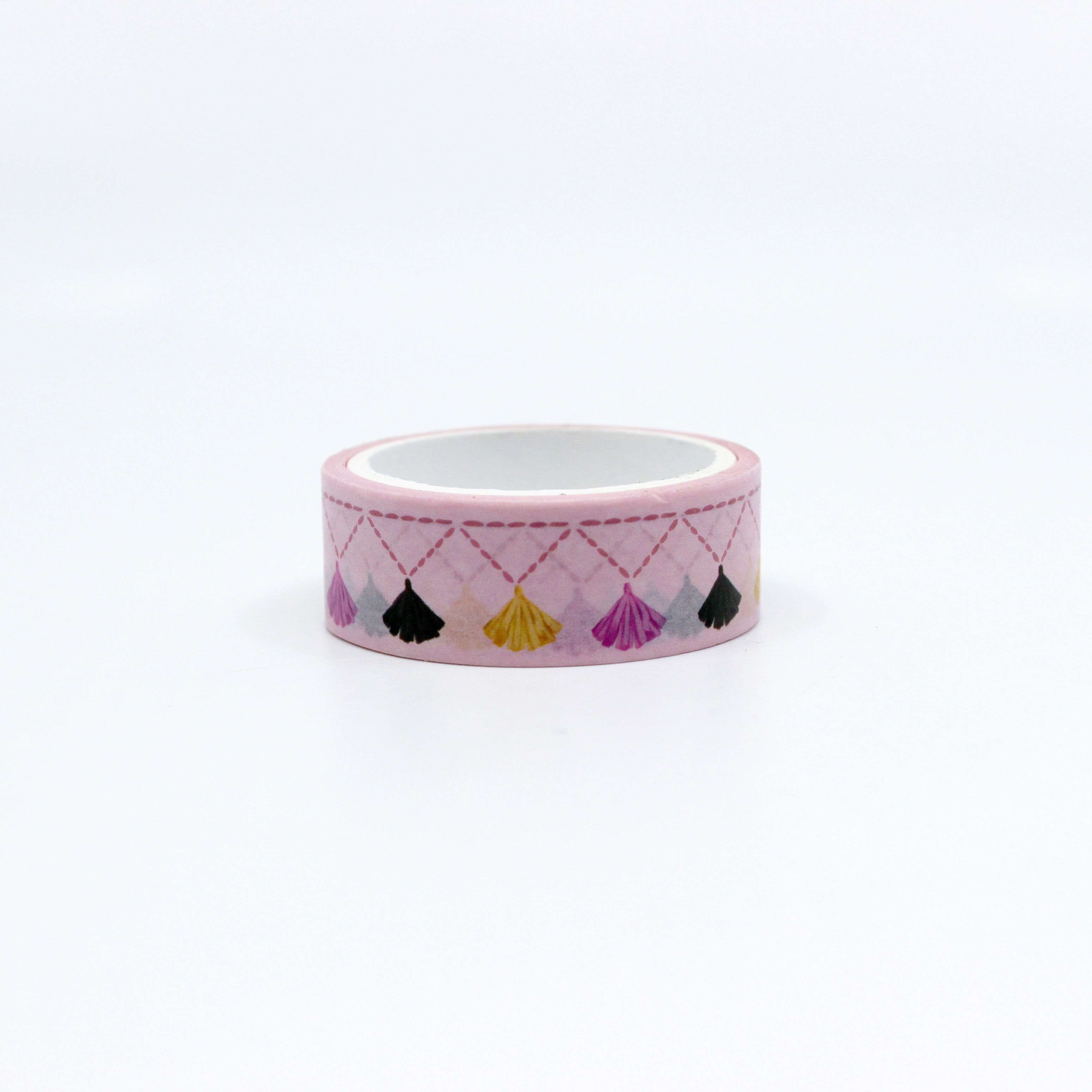 Elevate your crafts with our Chic Pink Tassel Washi Tape, featuring stylish tassel motifs in a trendy shade of pink. Ideal for adding a fashionable and decorative touch to your projects. This tape is sold at BBB Supplies Craft Shop.