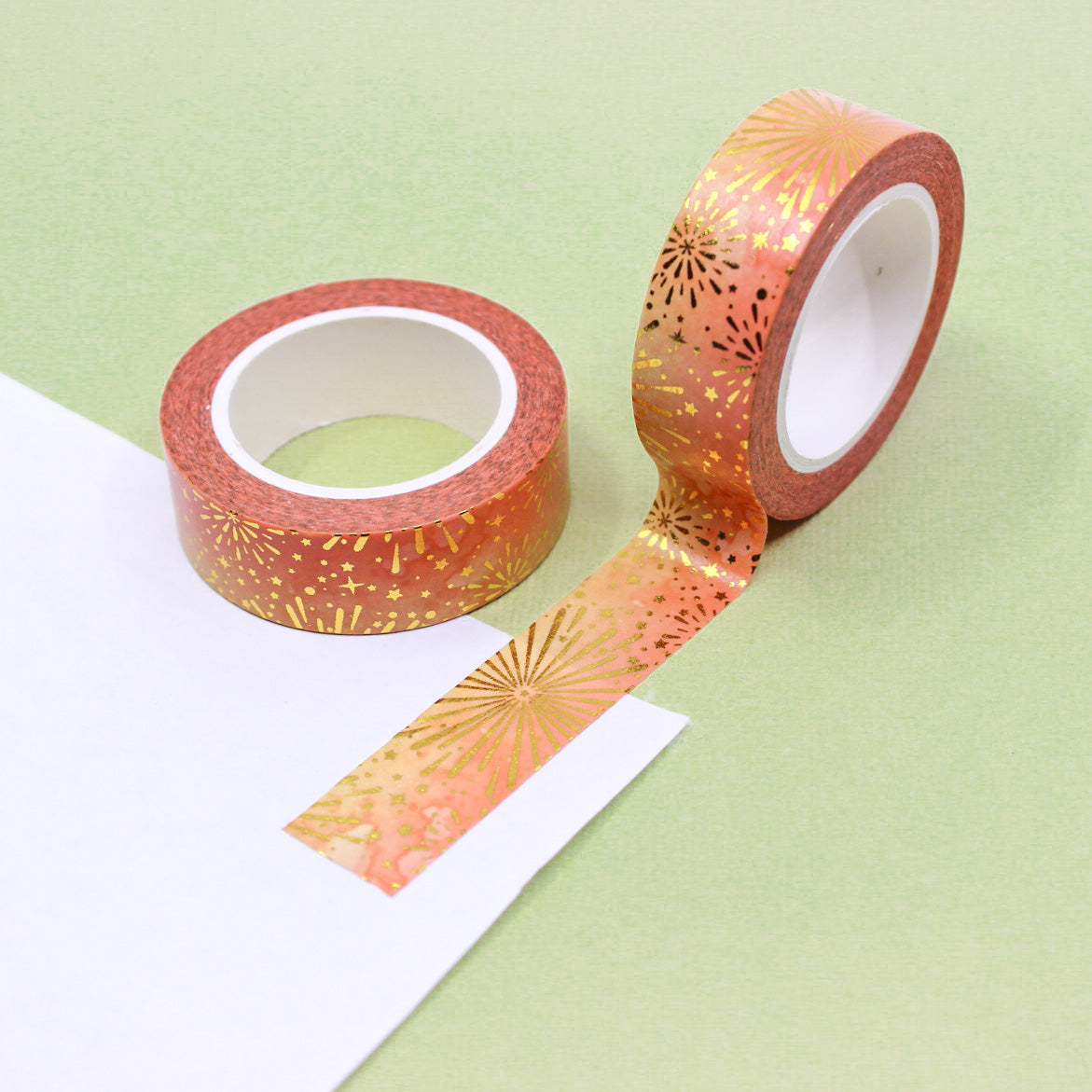 Orange washi tape with sparkling gold foil fireworks accents