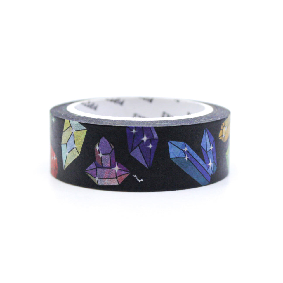 Add a touch of natural beauty to your projects with our Geode Crystal Formations on Black Background Washi Tape, adorned with stunning geode crystal patterns. Ideal for adding a touch of elegance and Earth-inspired design to your crafts. This tape is from Pipsticks and sold at BBB Supplies Craft Shop.