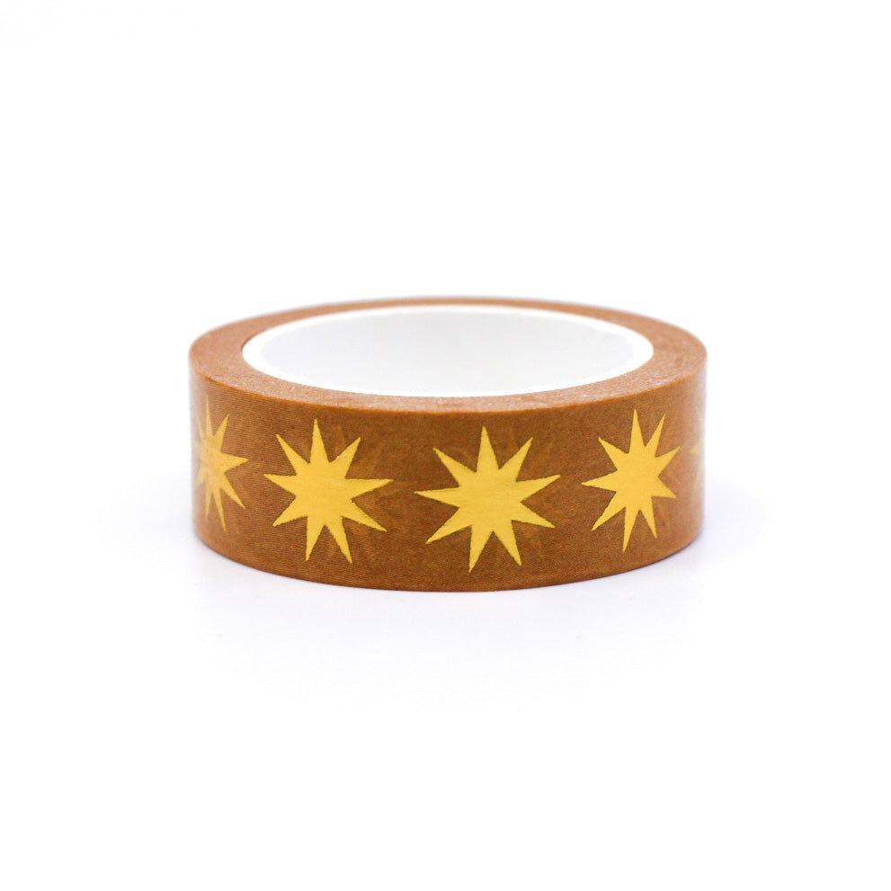 Add a touch of timeless glamour to your projects with our Retro Gold Star Washi Tape. This tape features a classic design of golden stars against a yellow Ochre backdrop. giving your creations a touch of vintage elegance. Perfect for embellishing scrapbooks, planners, or crafting personalized cards, this washi tape brings a nostalgic charm. This tape is from Worthwhile Paper and sold at BBB Supplies Craft Shop.