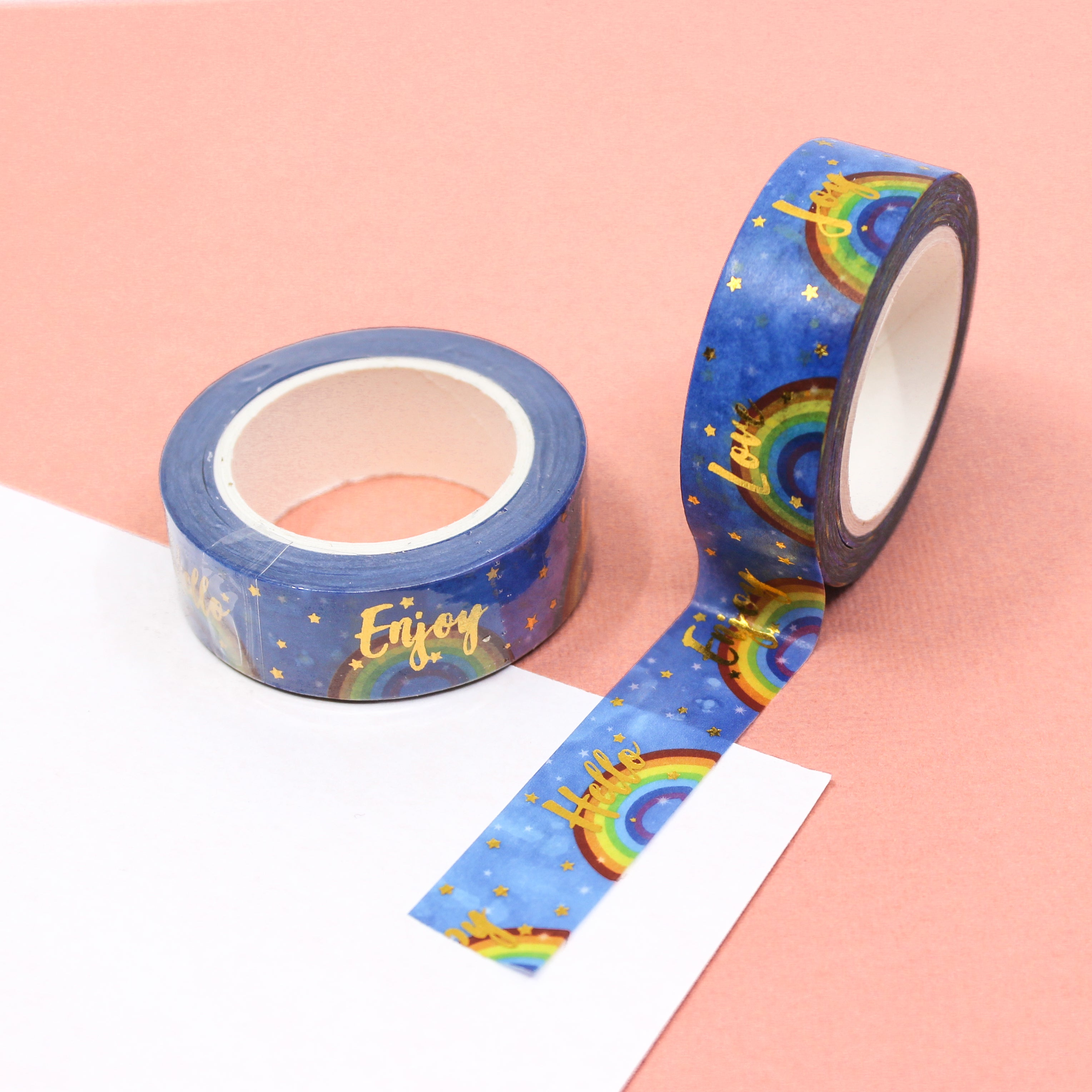 Elevate your crafts with our Gold Foil Positive Words & Rainbows Washi Tape, featuring uplifting phrases and vibrant rainbow designs in shimmering gold foil. Ideal for adding positivity and style to your projects. This tape is sold at BBB Supplies Craft Shop.