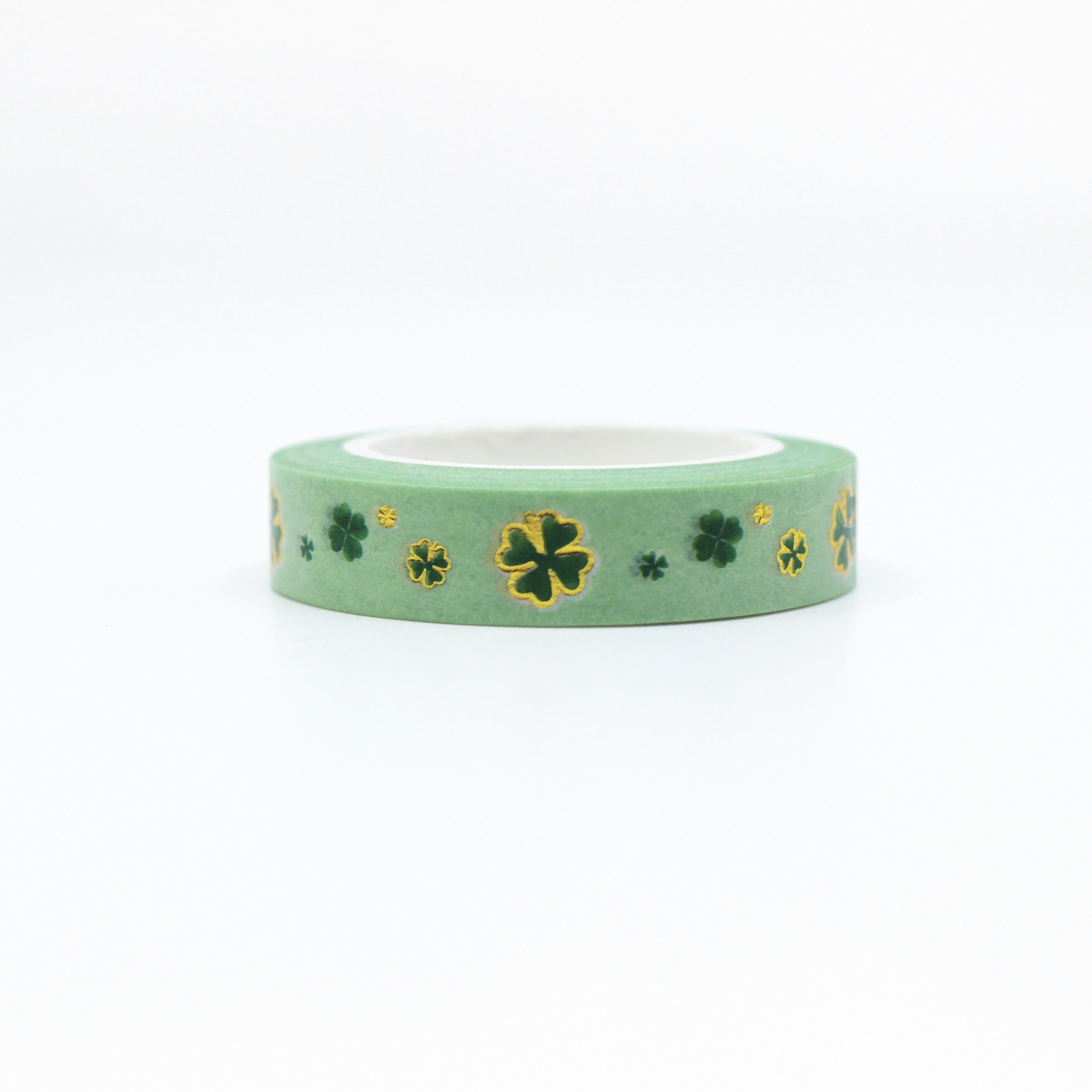 Green & Gold Foil Clover Washi Tape: Celebrate St. Patrick's Day or add a touch of luck to your projects with this charming washi tape featuring a pattern of green clovers accented with gold foil. Ideal for crafts, cards, and decor. This tape is sold at BBB Supplies craft Shop.