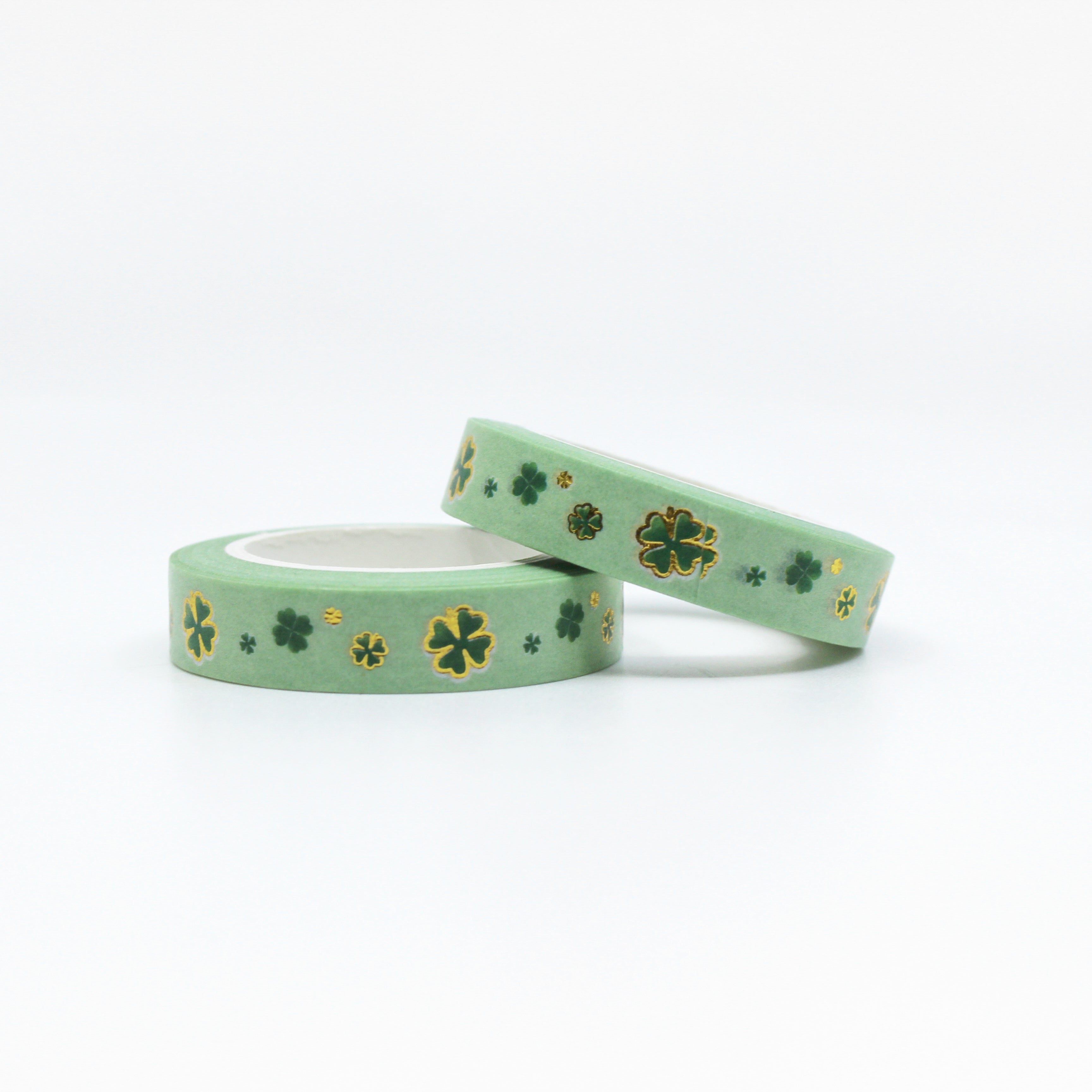 Green & Gold Foil Clover Washi Tape: Celebrate St. Patrick's Day or add a touch of luck to your projects with this charming washi tape featuring a pattern of green clovers accented with gold foil. Ideal for crafts, cards, and decor. This tape is sold at BBB Supplies craft Shop.